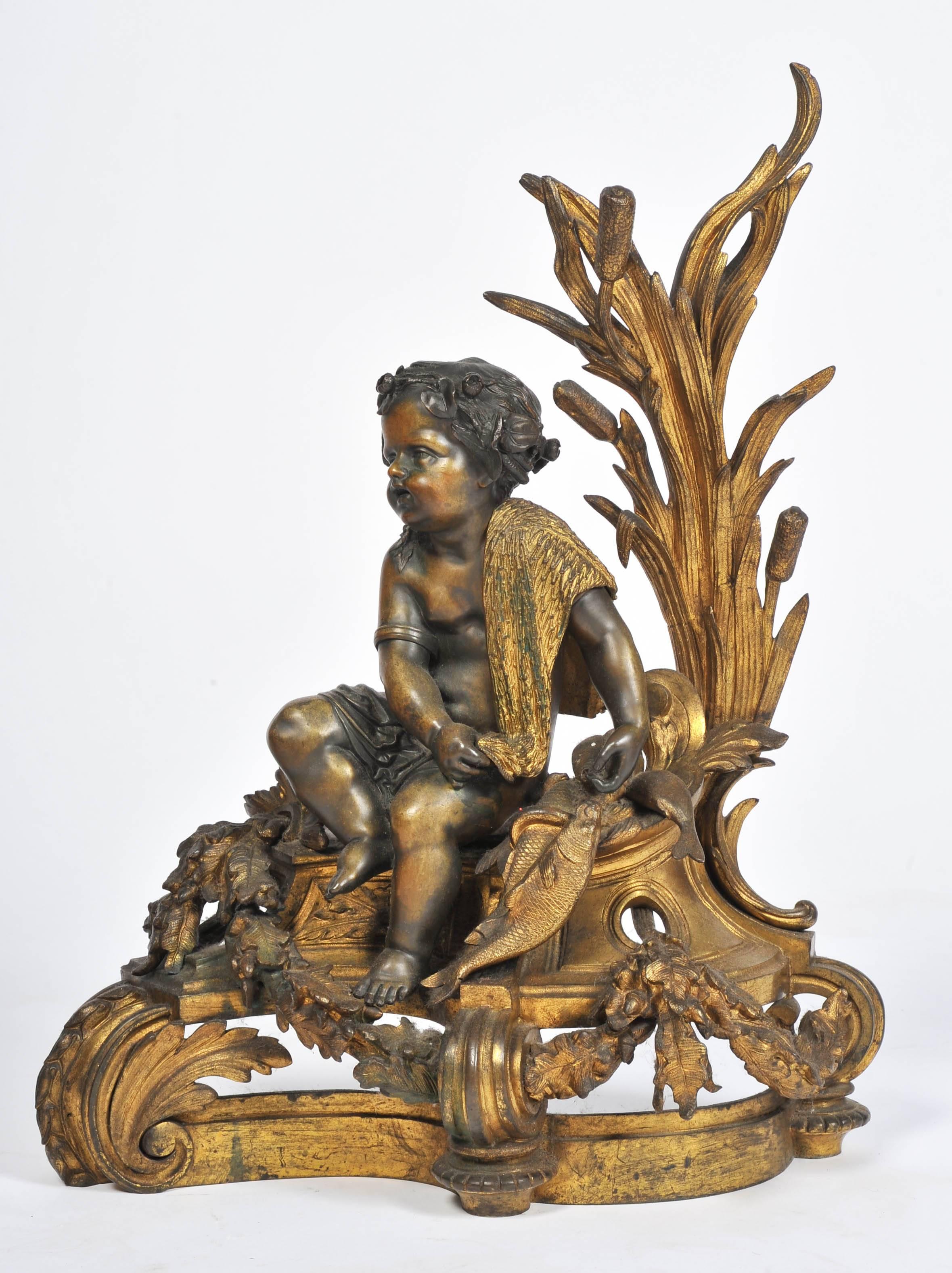 A wonderful quality pair of early 19th century gilded ormolu and bronze fire place Chenets. Depicting putti resting amongst Bullrushes, one with a bow and arrow the other with a fishing net.
