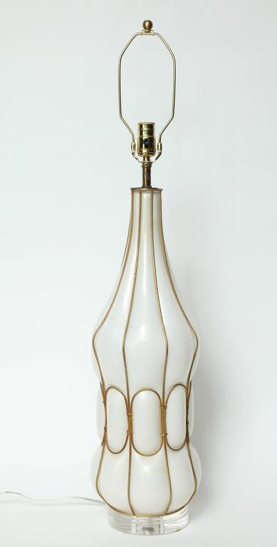 Modernist Mid-Century white Murano glass lamp with 22-karat gold dust inclusions. Lamp body is 