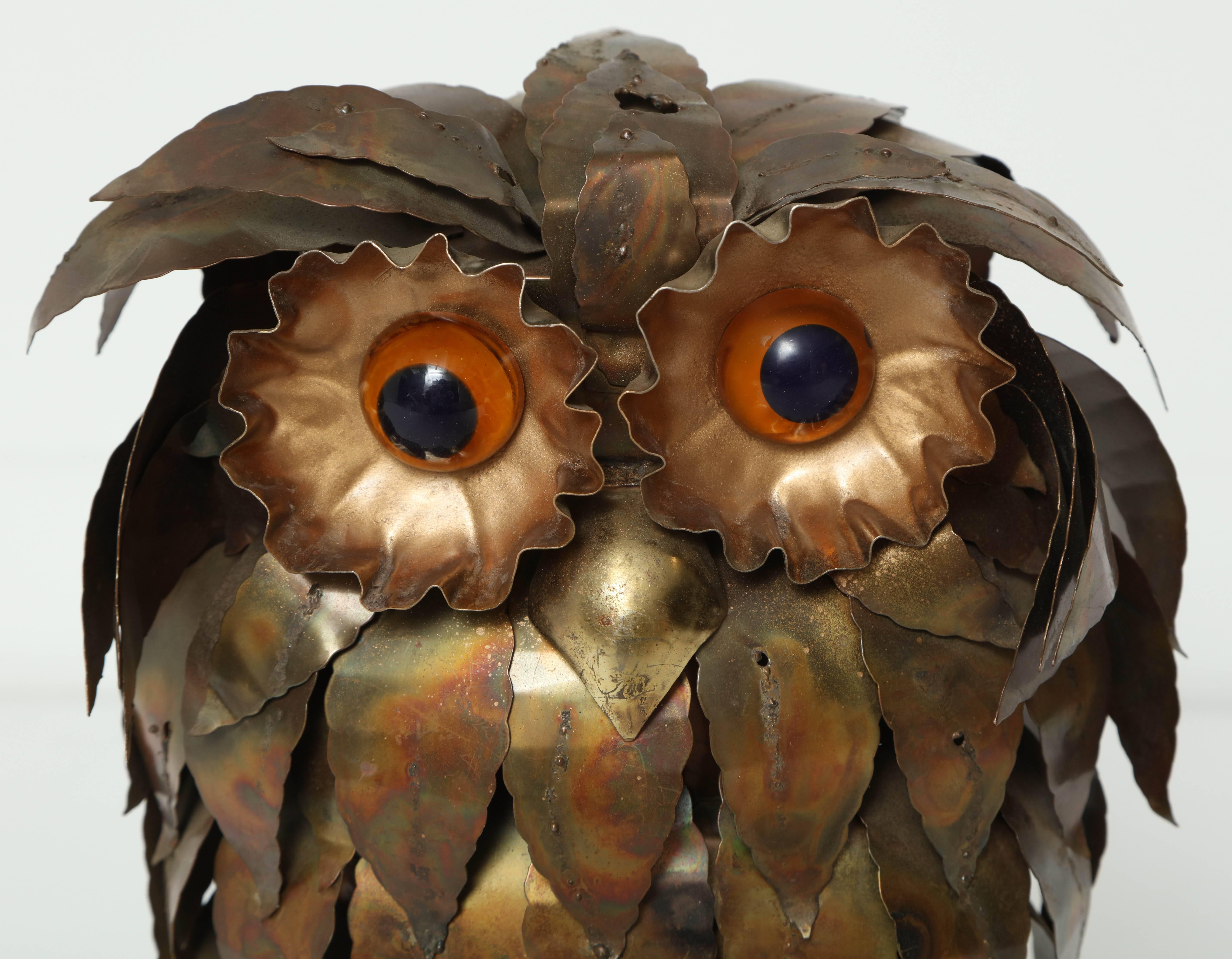 Decorative, mid-century, brass owl sculpture in the style of Curtis Jere, circa 1950.