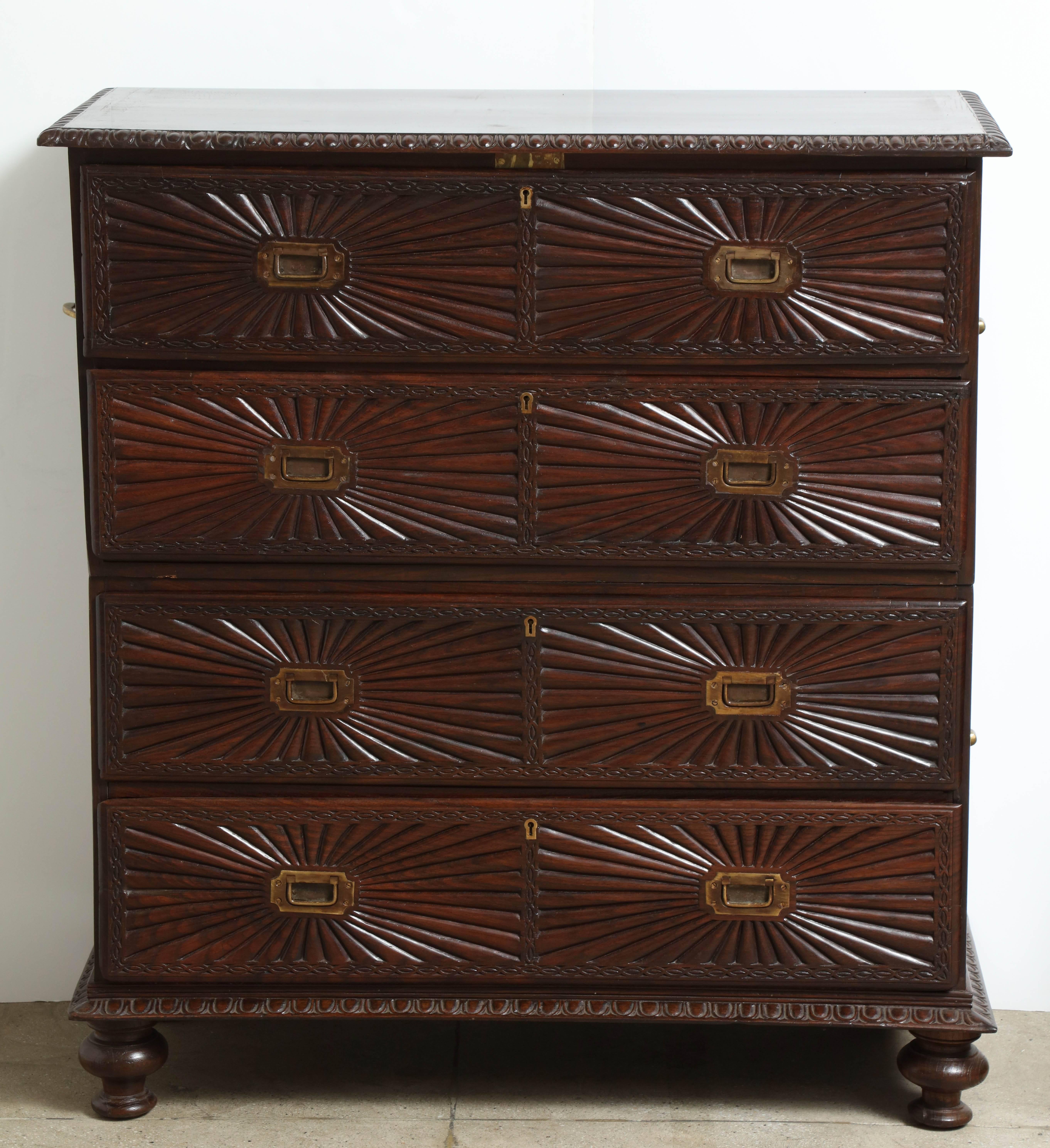 The chest is in rosewood with sunburn pattern.
The top is a secretary on a two-drawer chest.

 