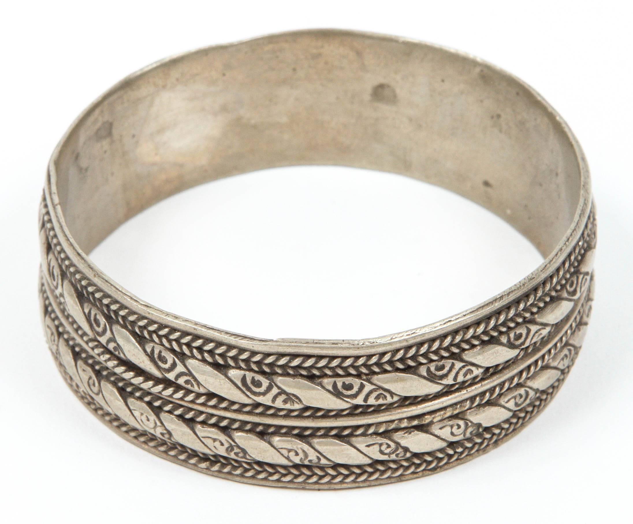 Moroccan Berber tribal bracelet, made from Moroccan coin silver, not pure sterling silver. Vintage Ethnic tribal cuff, overlaid with chasing details. Bedouin and nomadic ethnic jewelry from the Maghreb, Morocco and North Africa is usually
