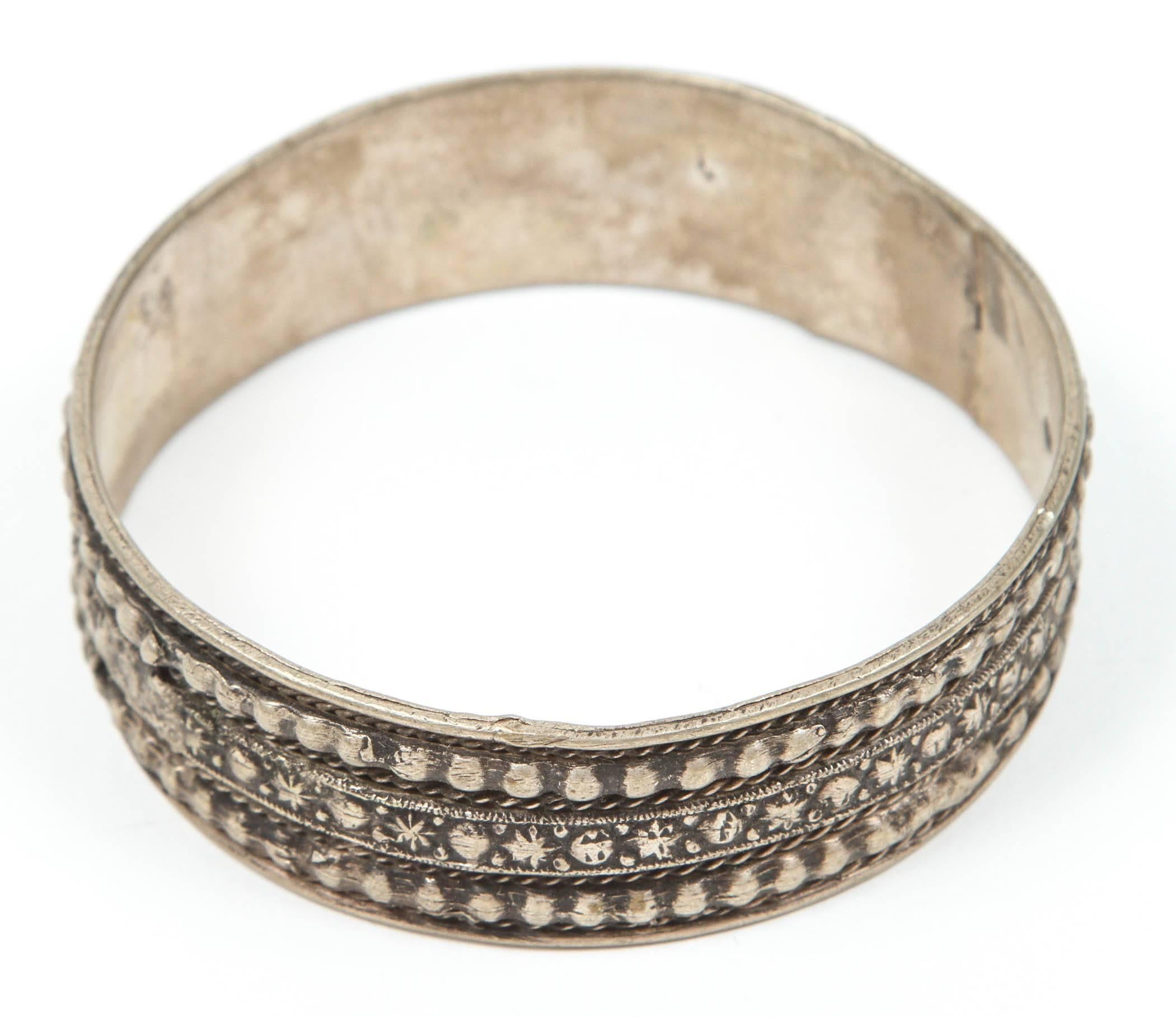 Moroccan tribal silver bracelet from the High Atlas of Morocco. 
Handcrafted by Berber women using Moroccan silver nickel. 
The ethnic Nomadic and Bedouin jewelry in the Maghreb and North Africa is usually made of silver and the designs are
