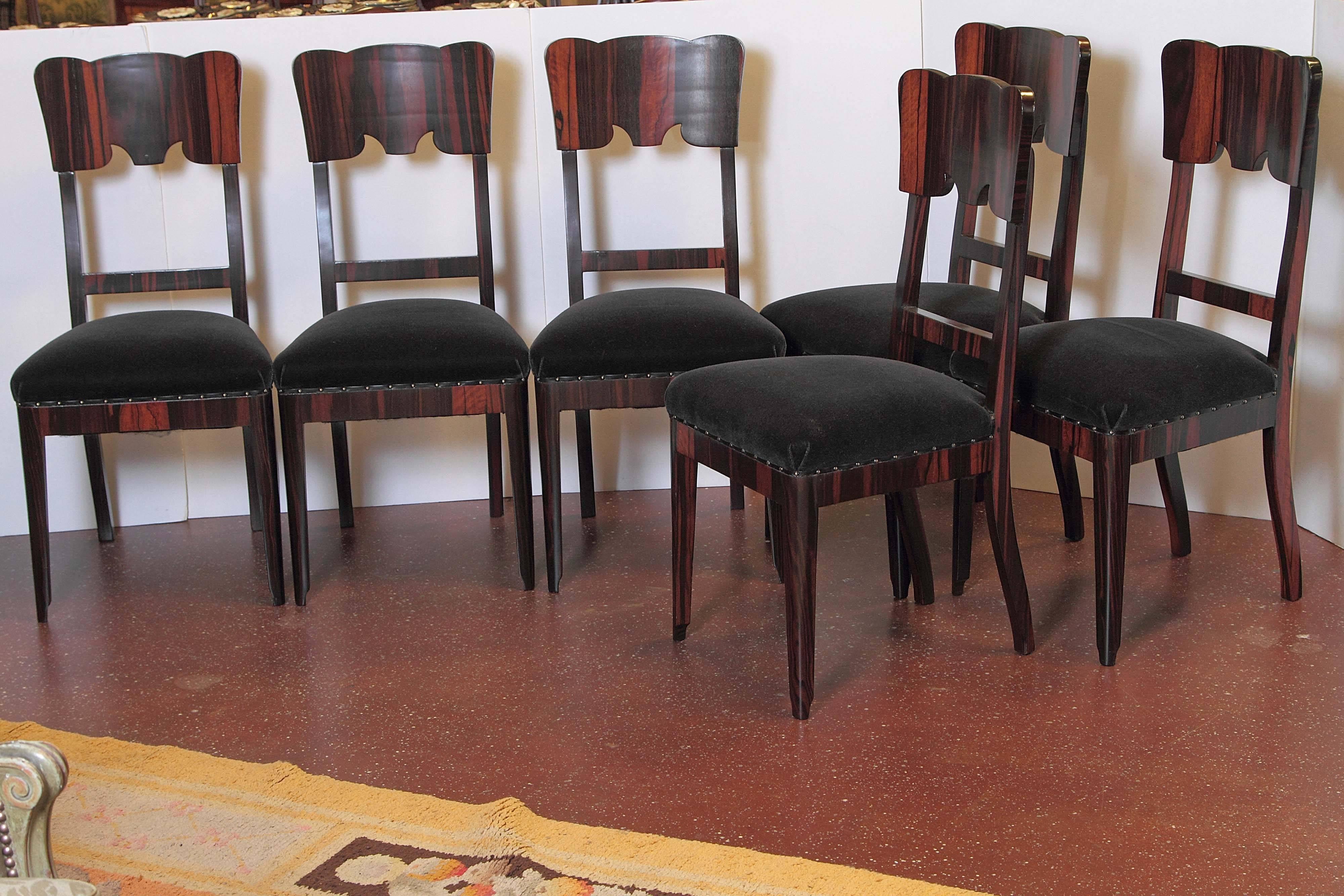 Set of six French Art Deco rosewood veneered side chairs.