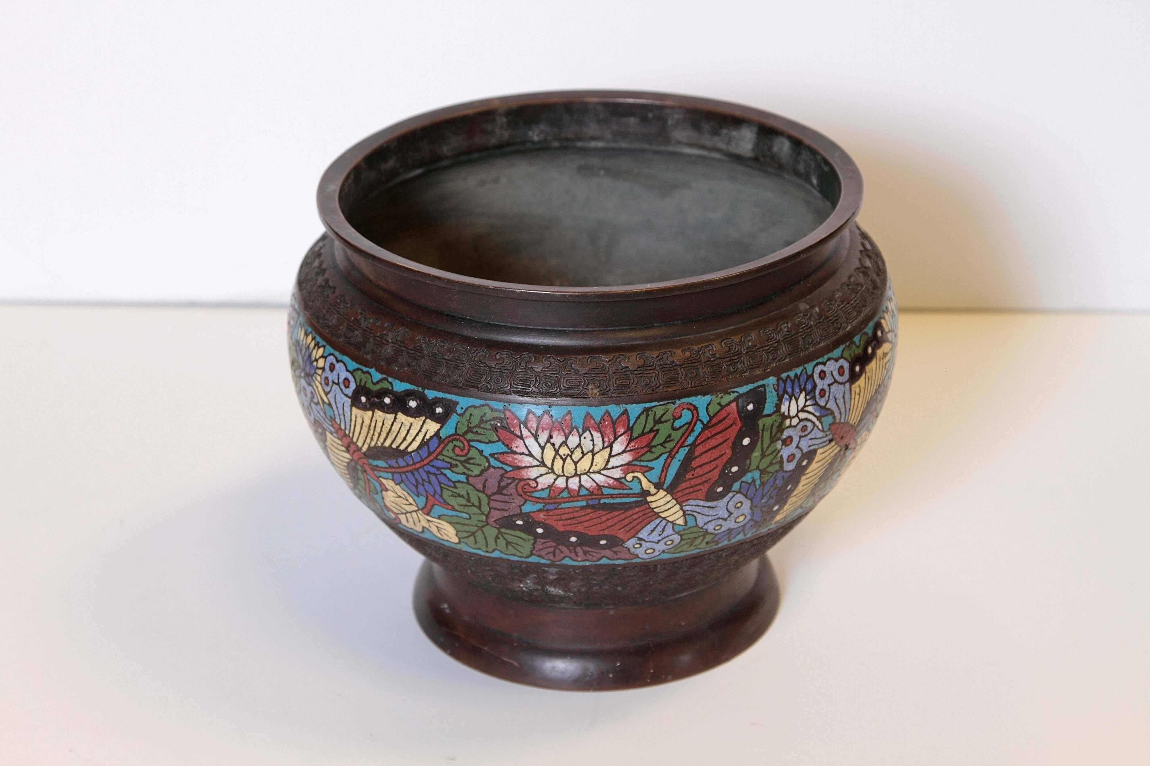 19th century cloisonné footed jardiniere with butterfly motif.