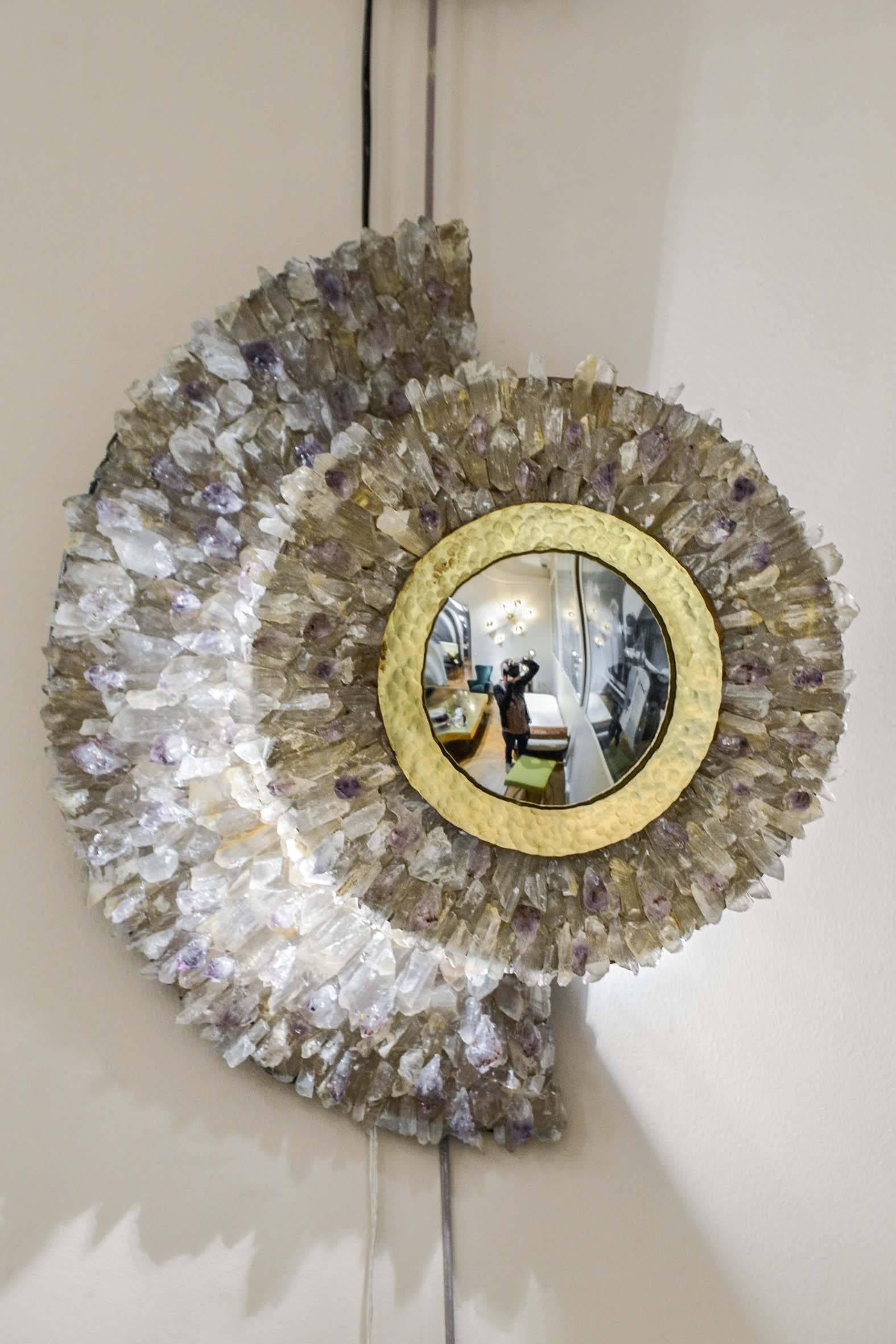 Pair of sconces with center in curved mirror, framed by a gilt circle with crystal rock and amethyst stones, unique pieces.