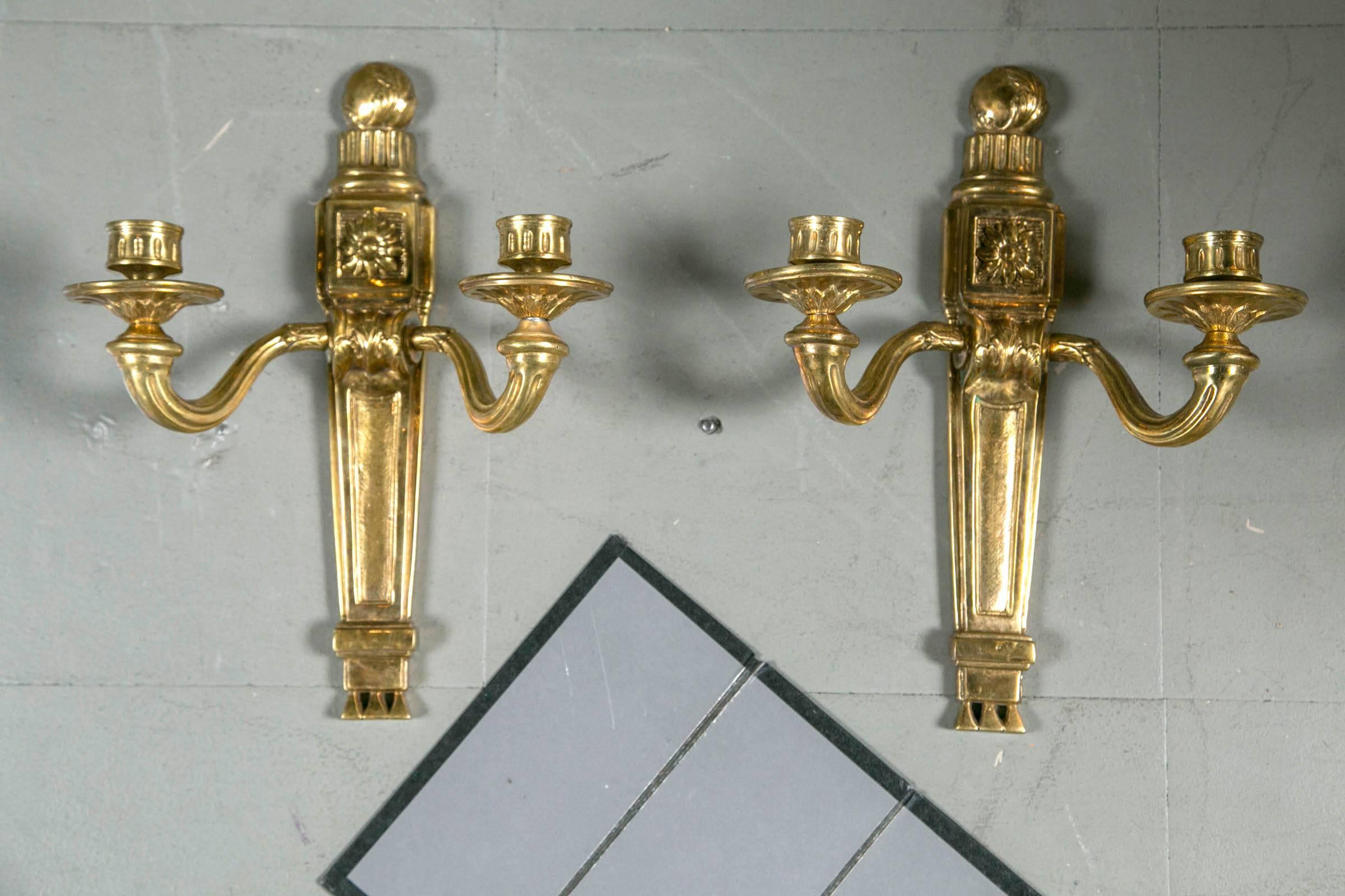 A set of eight, circa 1920s Caldwell sconces; $4,200 pair, four pairs available.