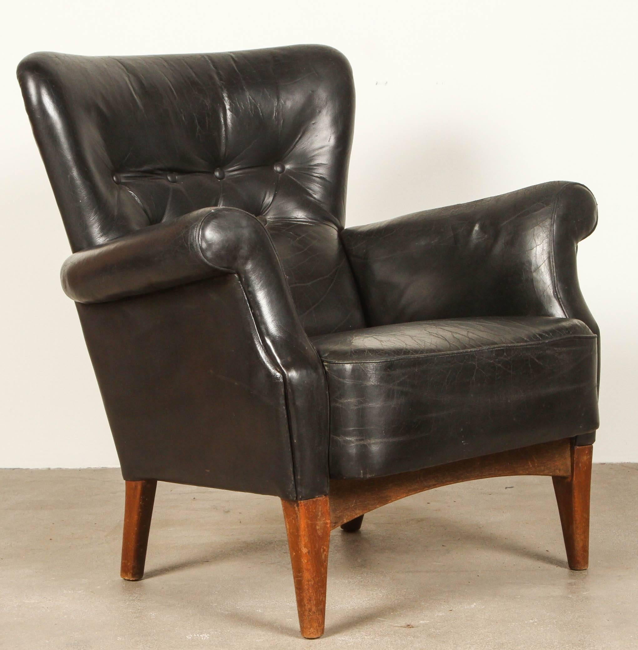 Black Leather Armchair by Finn Juhl In Distressed Condition In Los Angeles, CA