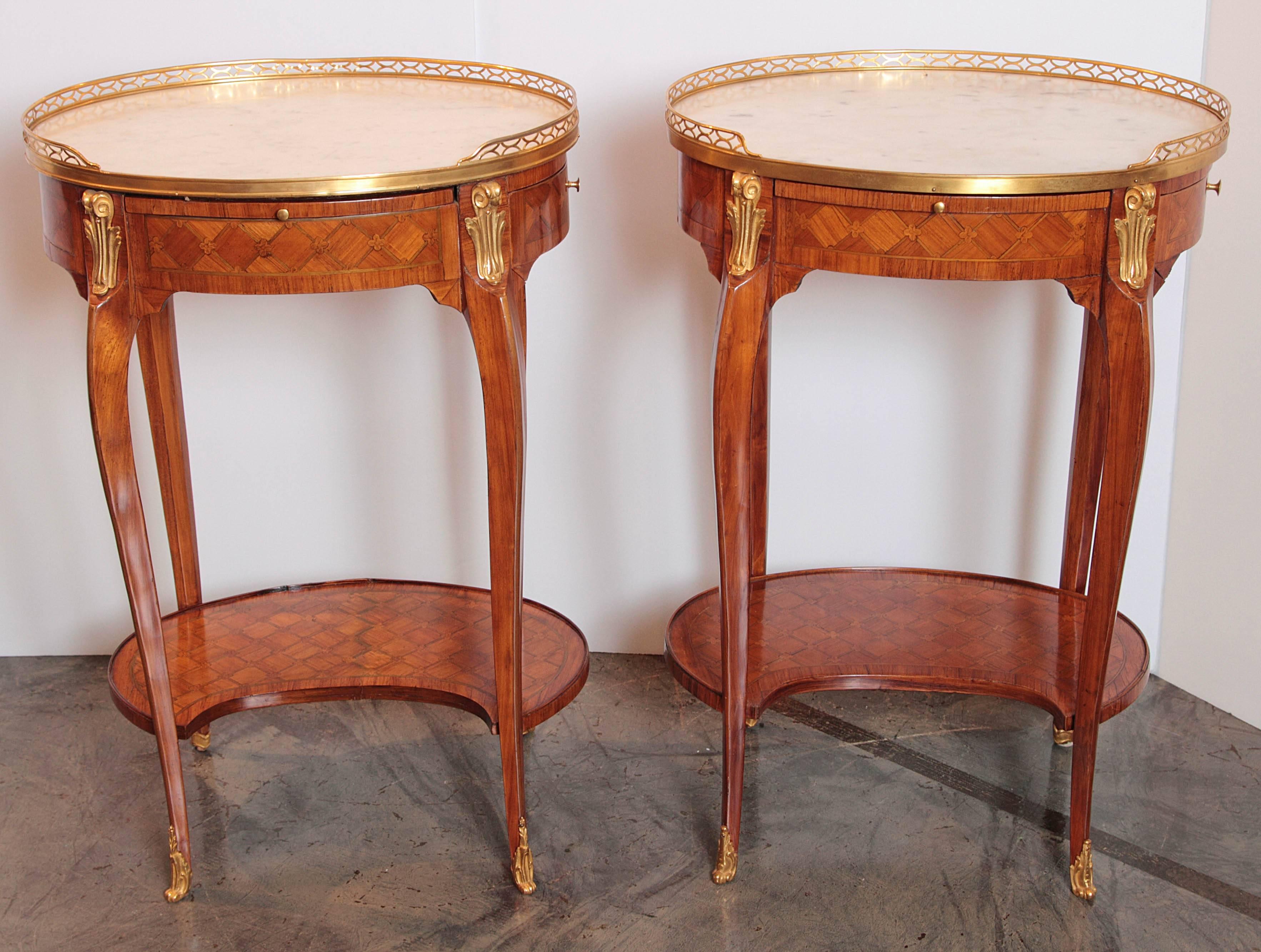 Pair of fine early 19th century French Louis XVI marble-topped kingwood side tables. Parquetry design Single drawer with leather tier pull-out.