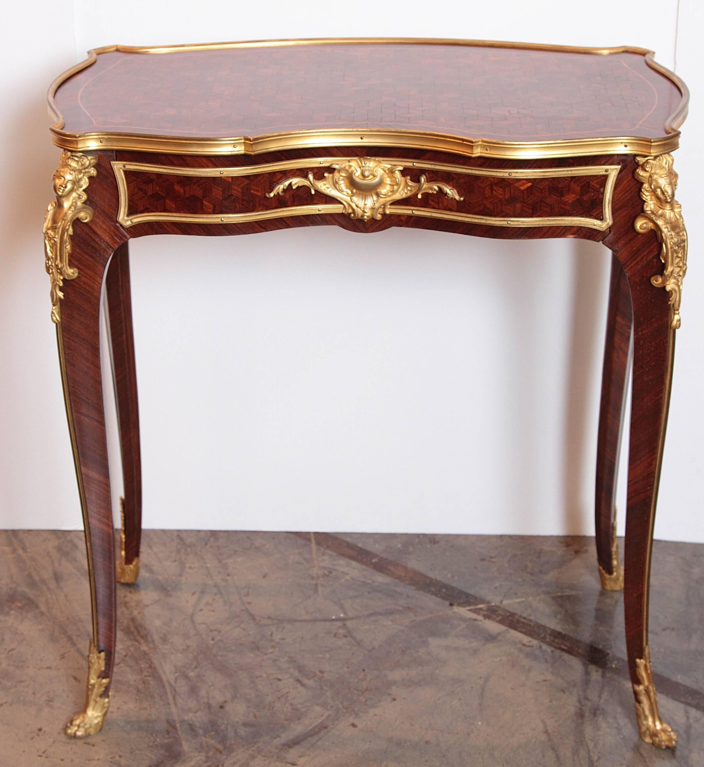 19th century fine side table by P Sormani. Gilt bronze figural chutes and pawed feet. Parquetry top single drawer.