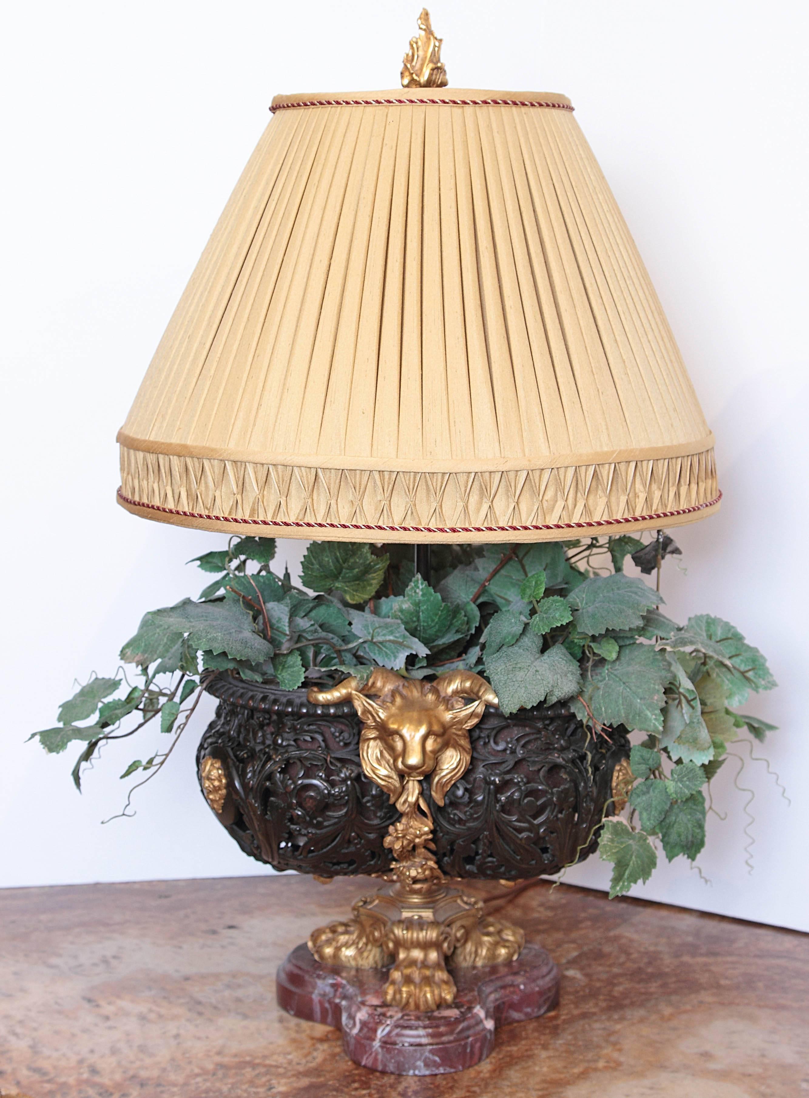 19th century French Empire patinated bronze and gilt bronze large planter with gilt bronze figures and pawed feet. Made into lamp.