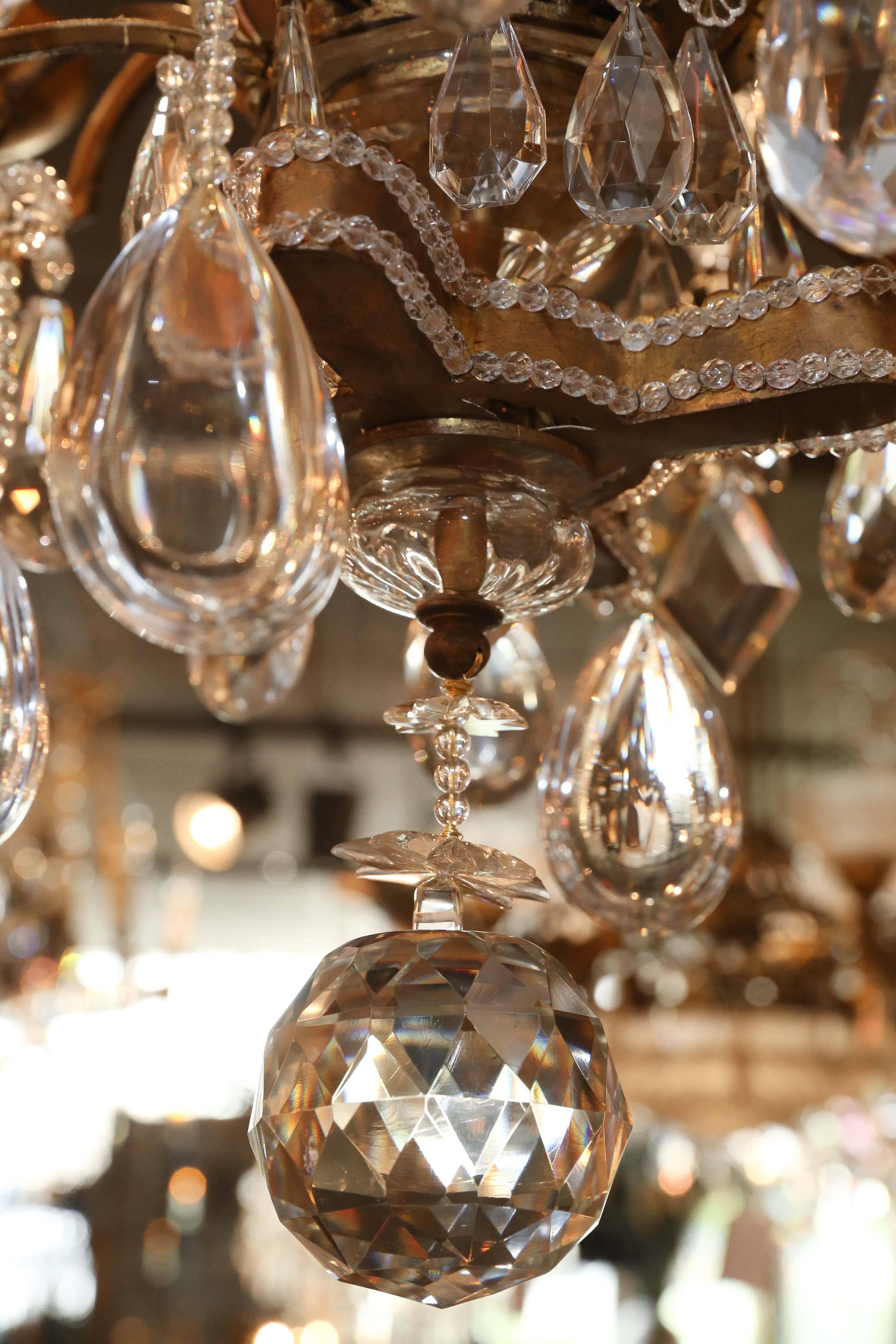 Impressive Bagues Chandelier, Large Size and Bronze and Crystal in swirl design In Excellent Condition In Houston, TX