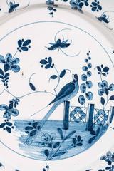 Blue and White Delft Charger Decorated with a Bird in a Garden