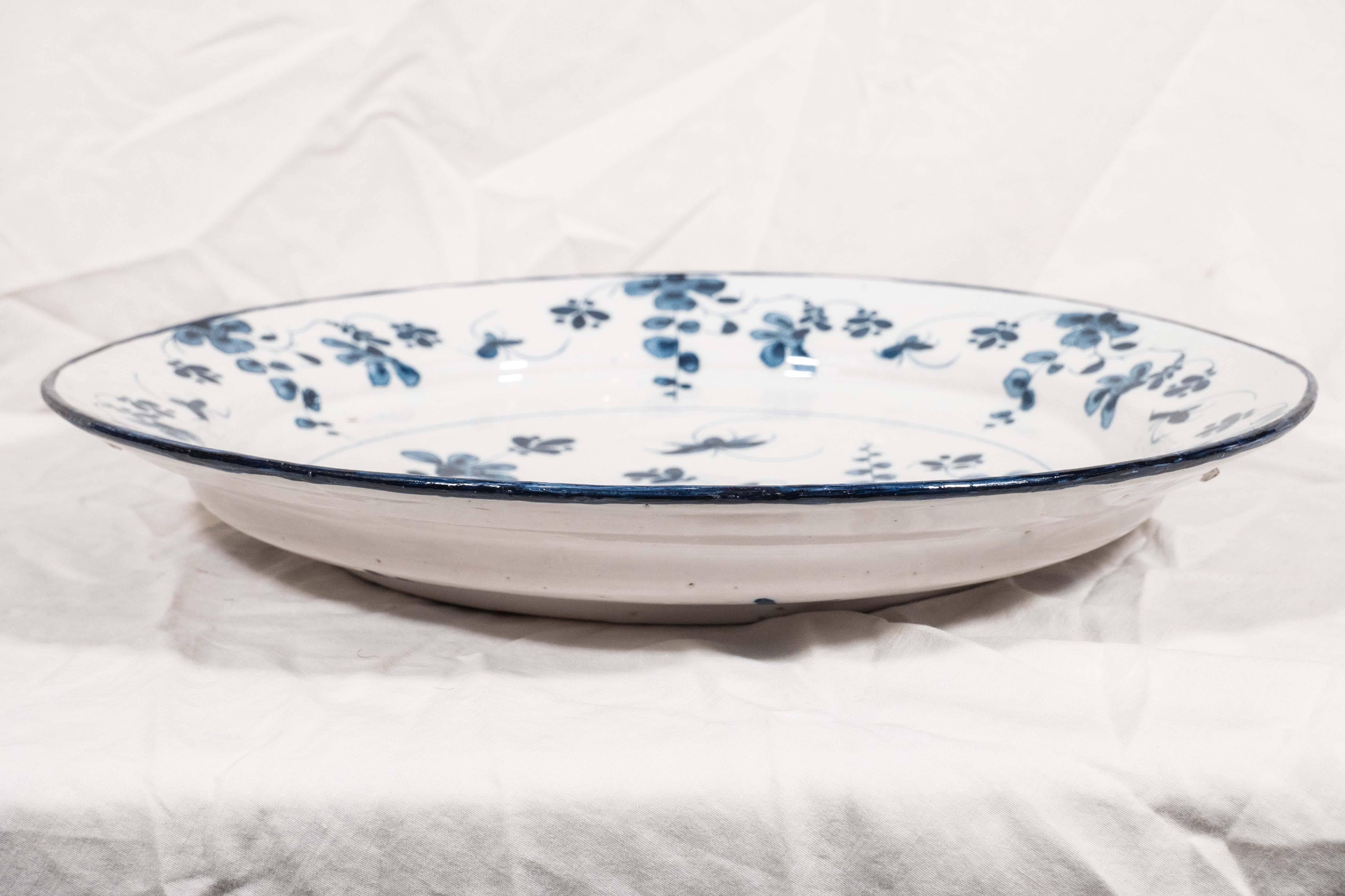 Late 18th Century Blue and White Delft Charger Decorated with a Bird in a Garden