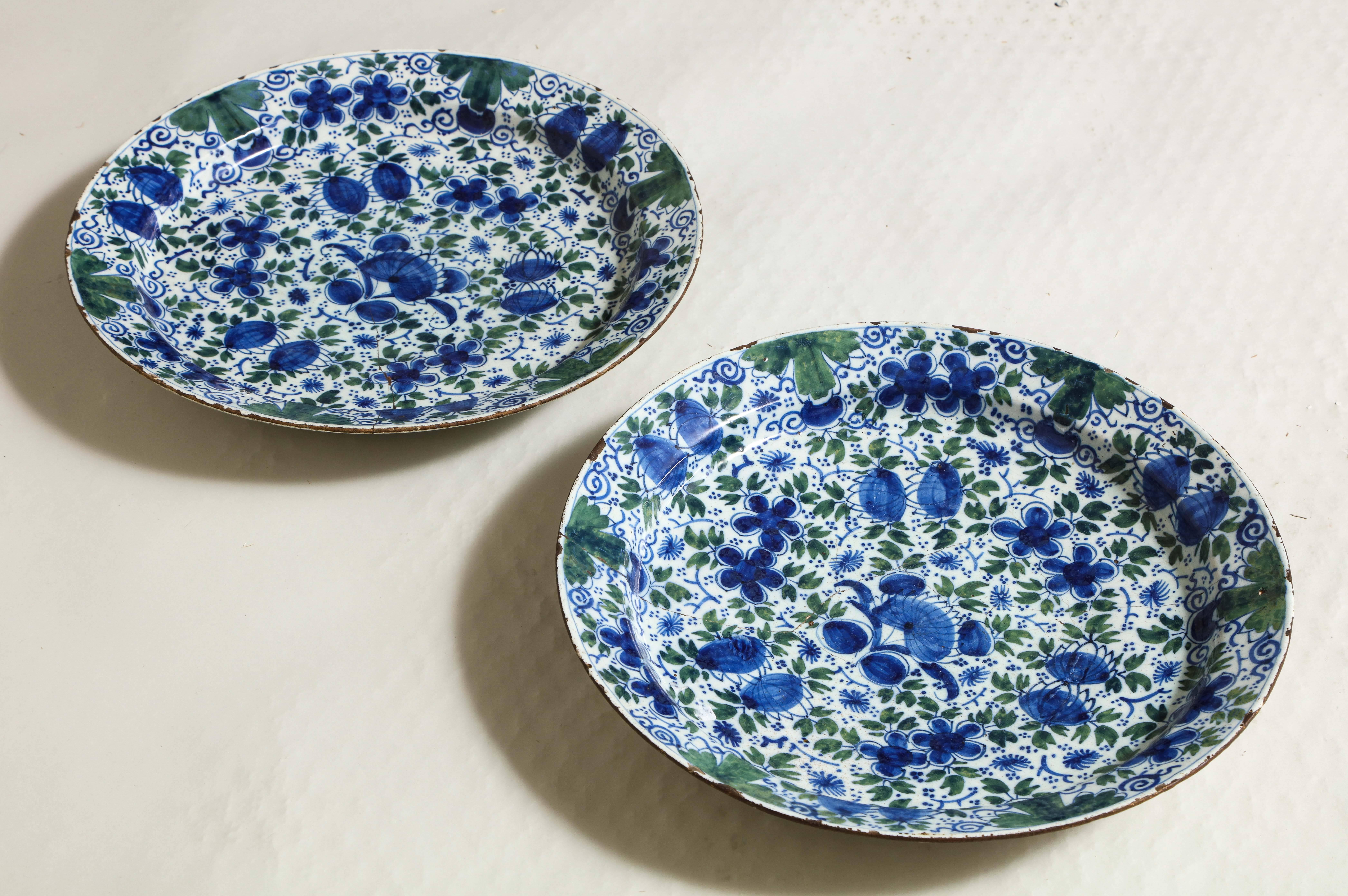 Georgian Pair of Profusely Decorated Delft Chargers