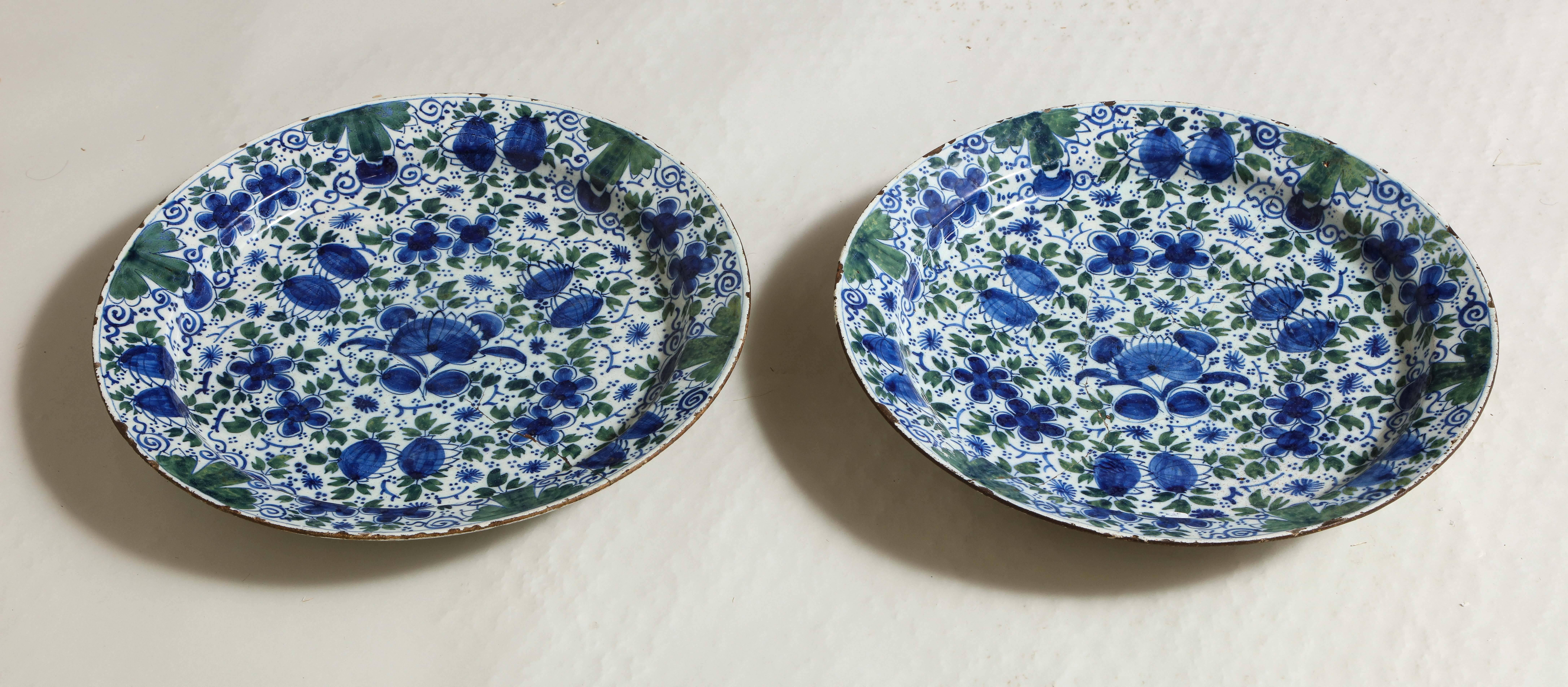 English Pair of Profusely Decorated Delft Chargers