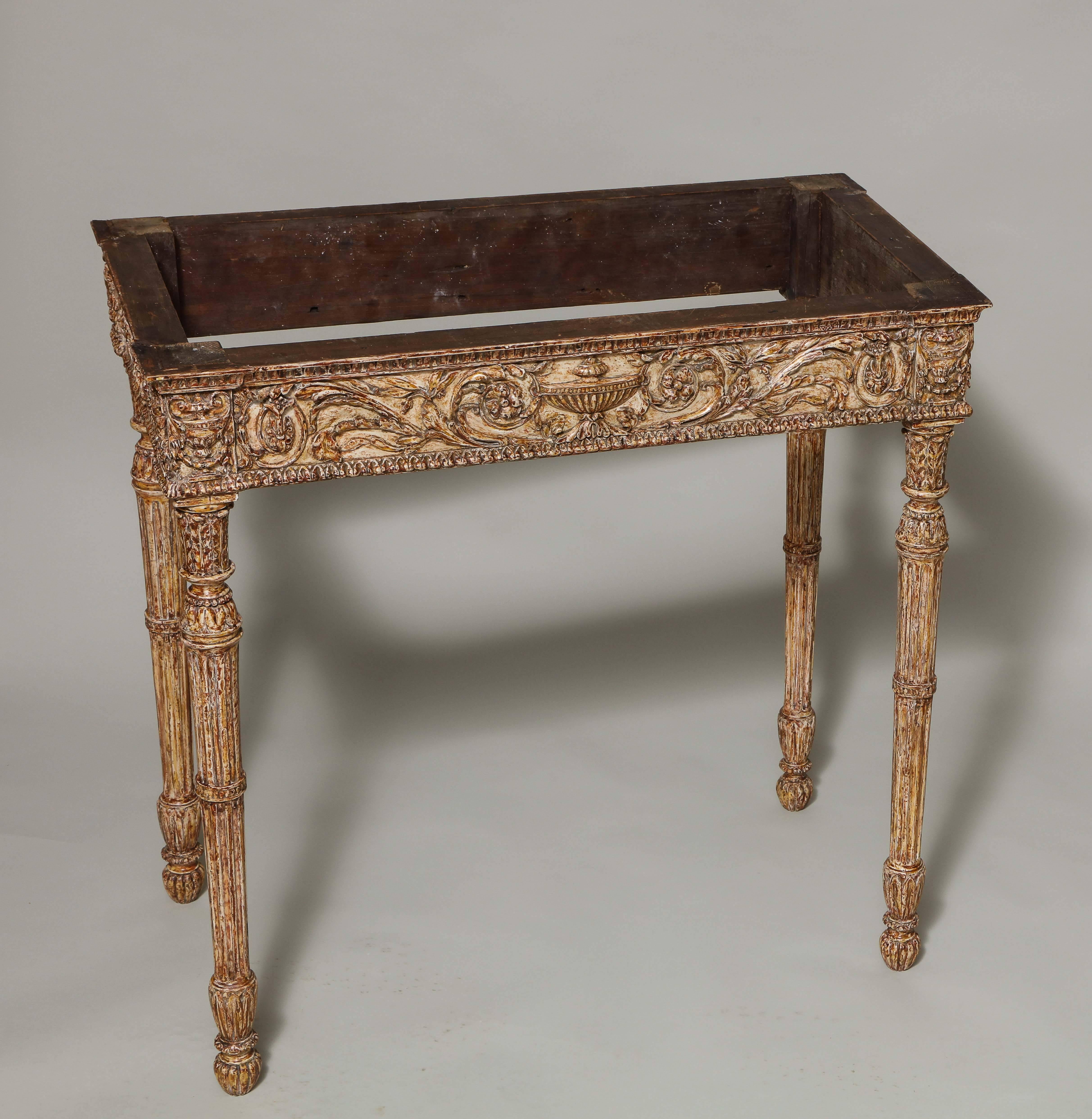 Very fine pair of English 19th century marble top console tables, the shaped tops with inset painted borders with honeysuckle and husk design, the centre with panels with classical figures, over carved aprons with urns, bell flowers and trailing