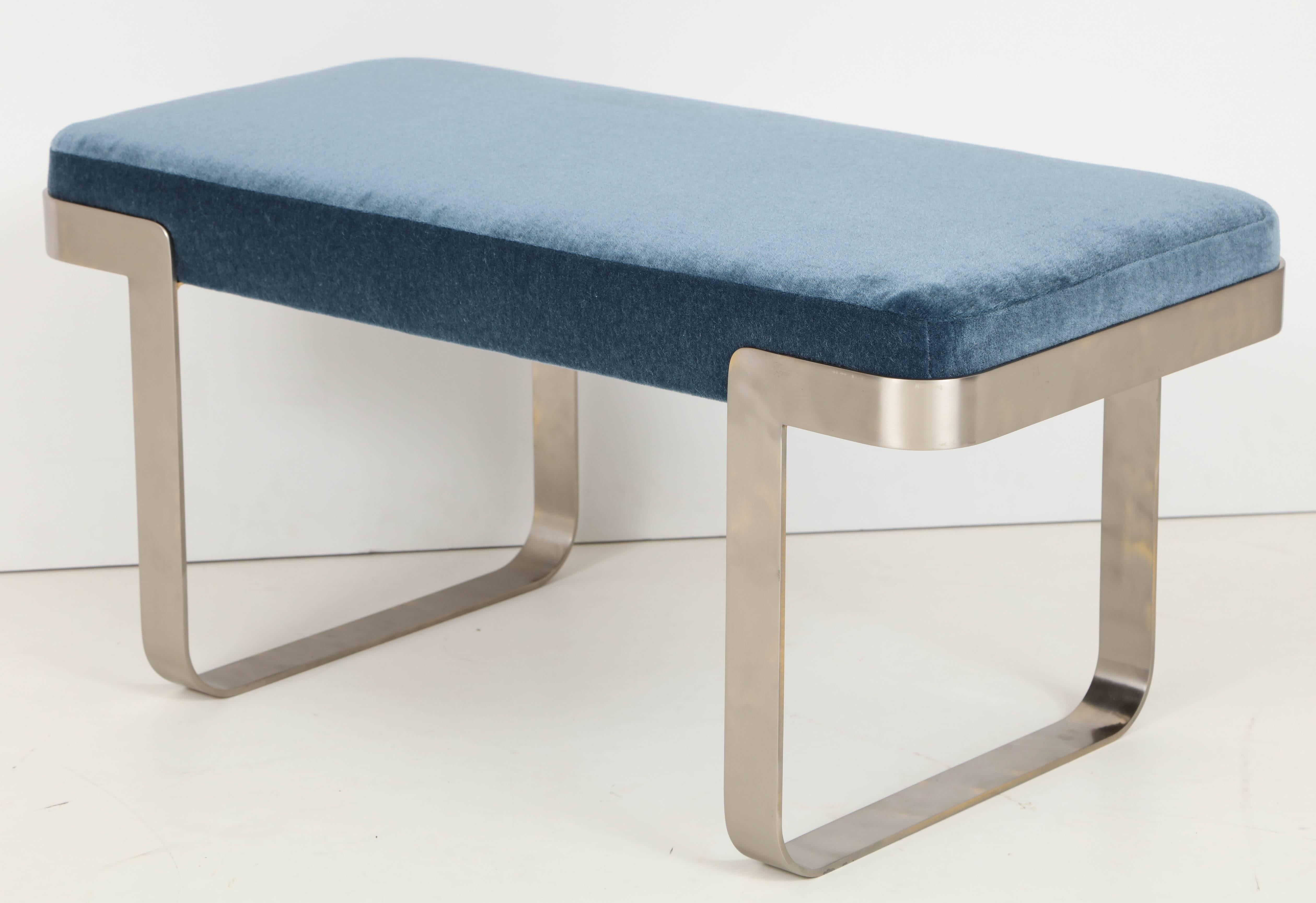 Modernist 1970s bench with heavy satin finished nickel frames which support a newly upholstered seat in a beautiful blue heavy mohair. In the style of Milo Baughman.