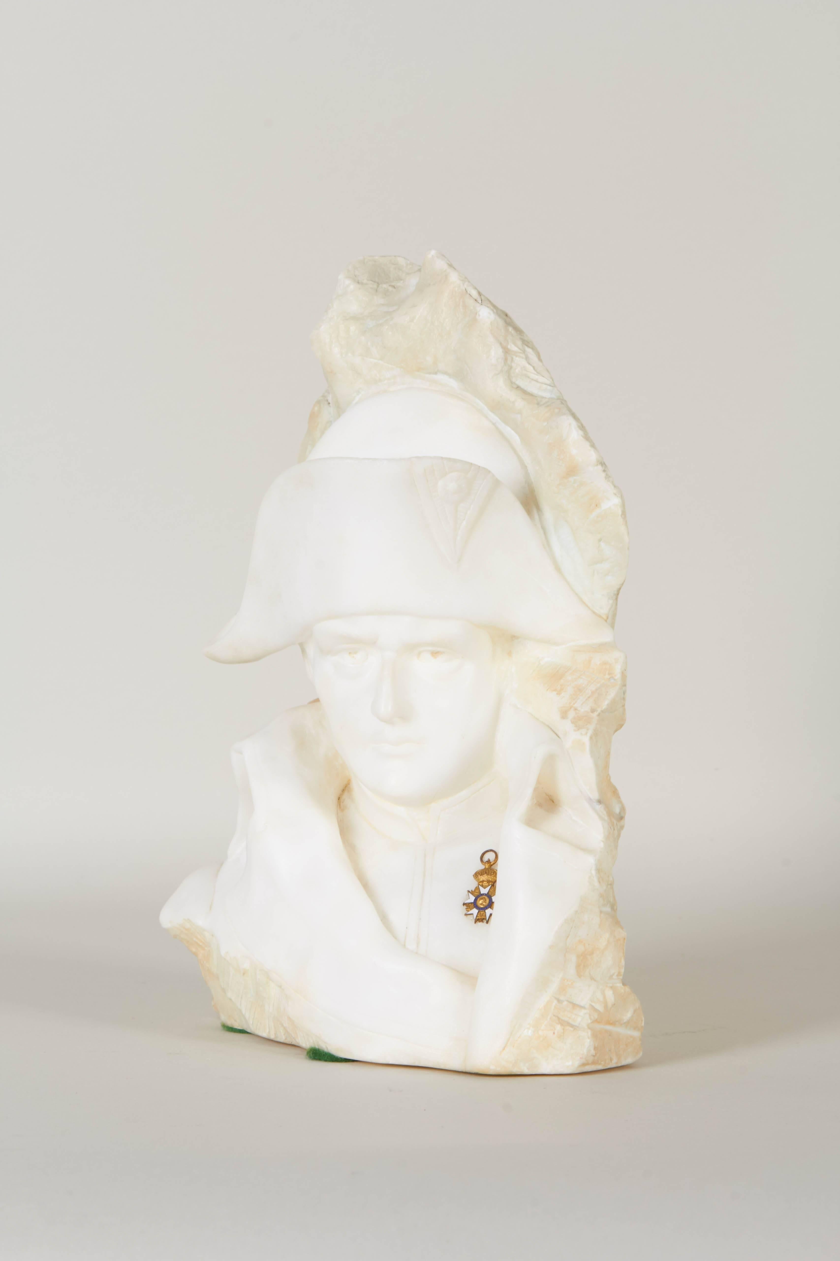 A Fritz Kochendörfer small scale carved alabaster bust of Napoleon Bonaparte, signed P. Braun, produced in Munich within the late 19th century period; the profile depicted emerging against rough cut stone. Signed [P. Braun] to lower half of the