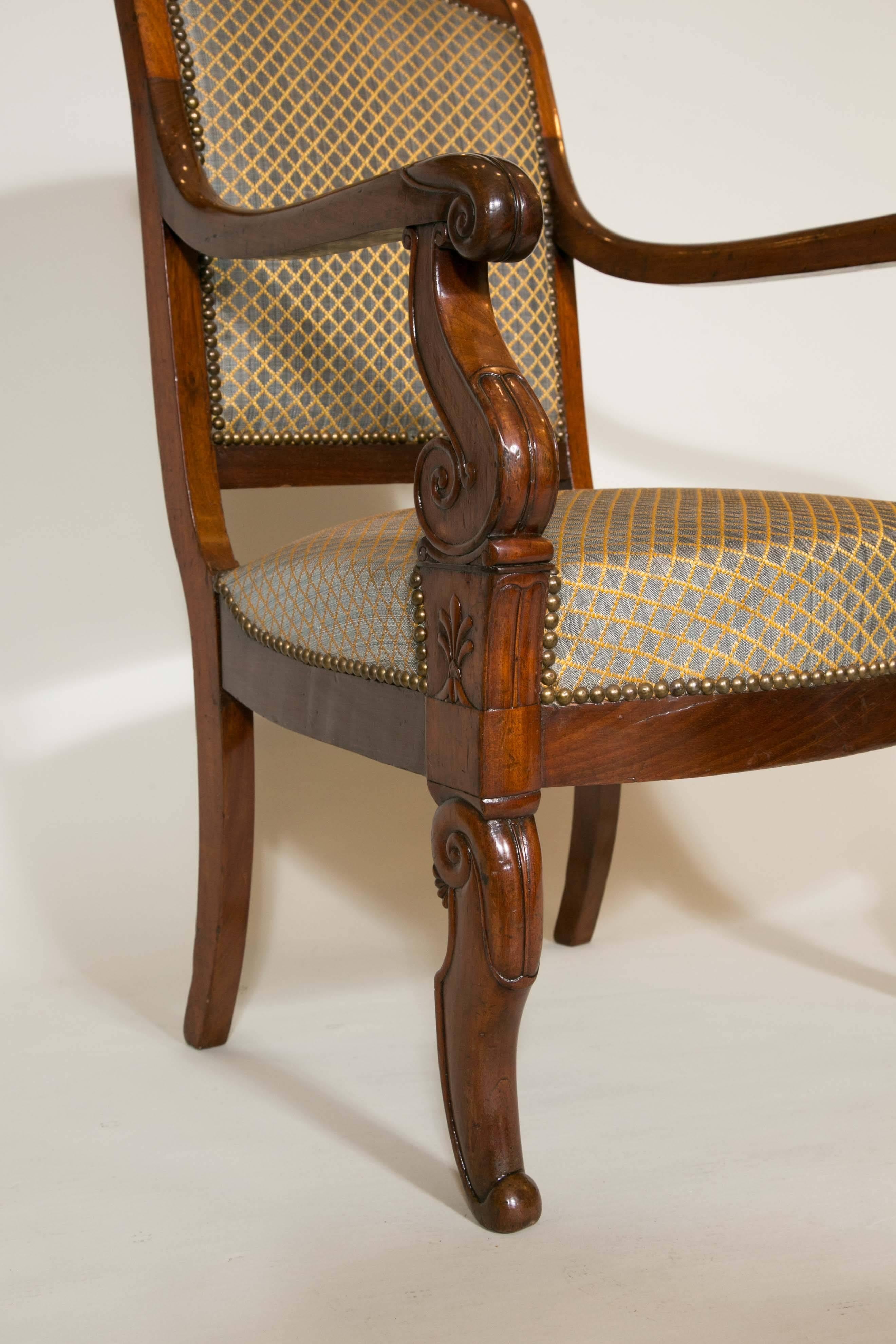 Suite of four armchairs from the Restauration period 19th century in solid mahogany, recently recovered.
 