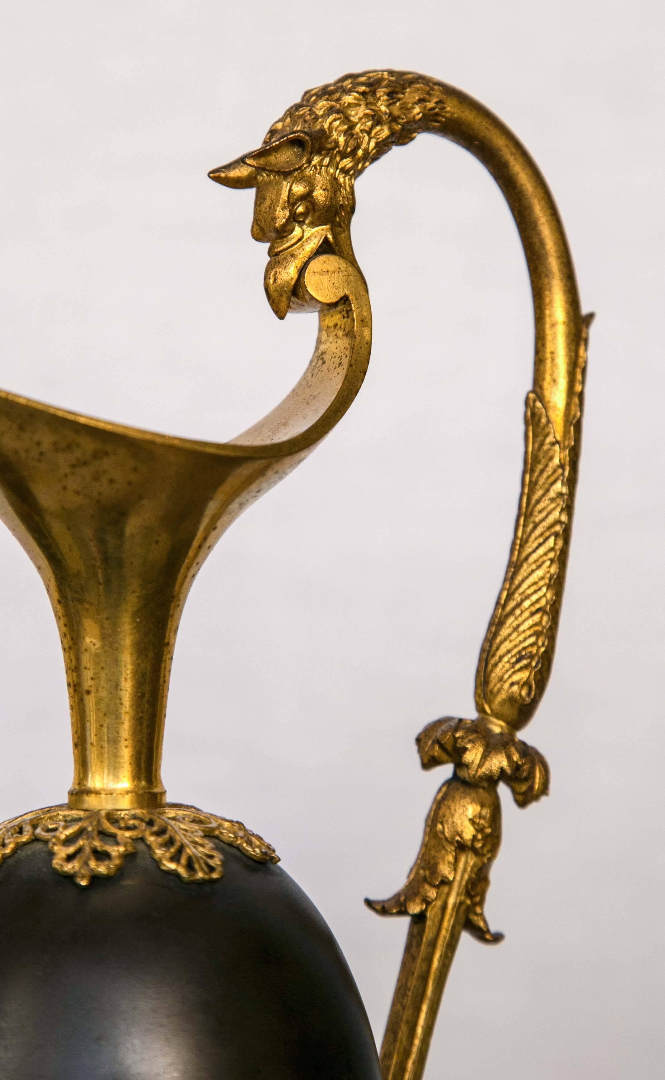 Pair of Period Empire Patinated and Gilt Bronze Ewers 2