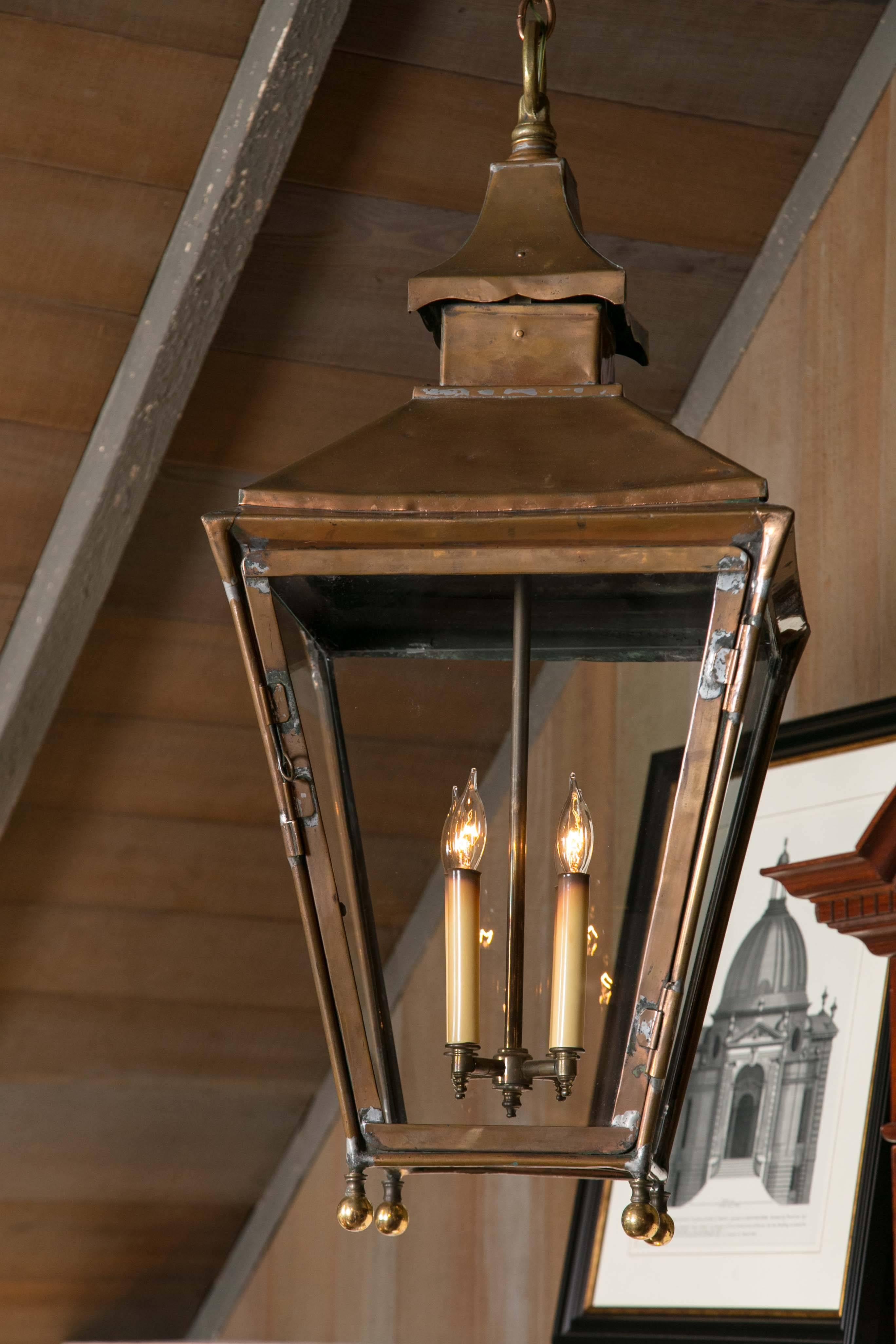 Large, handmade lantern in solid cooper. Classic in its design, this one-of-a-kind lantern would be focal point in any room, whether traditional or modern.