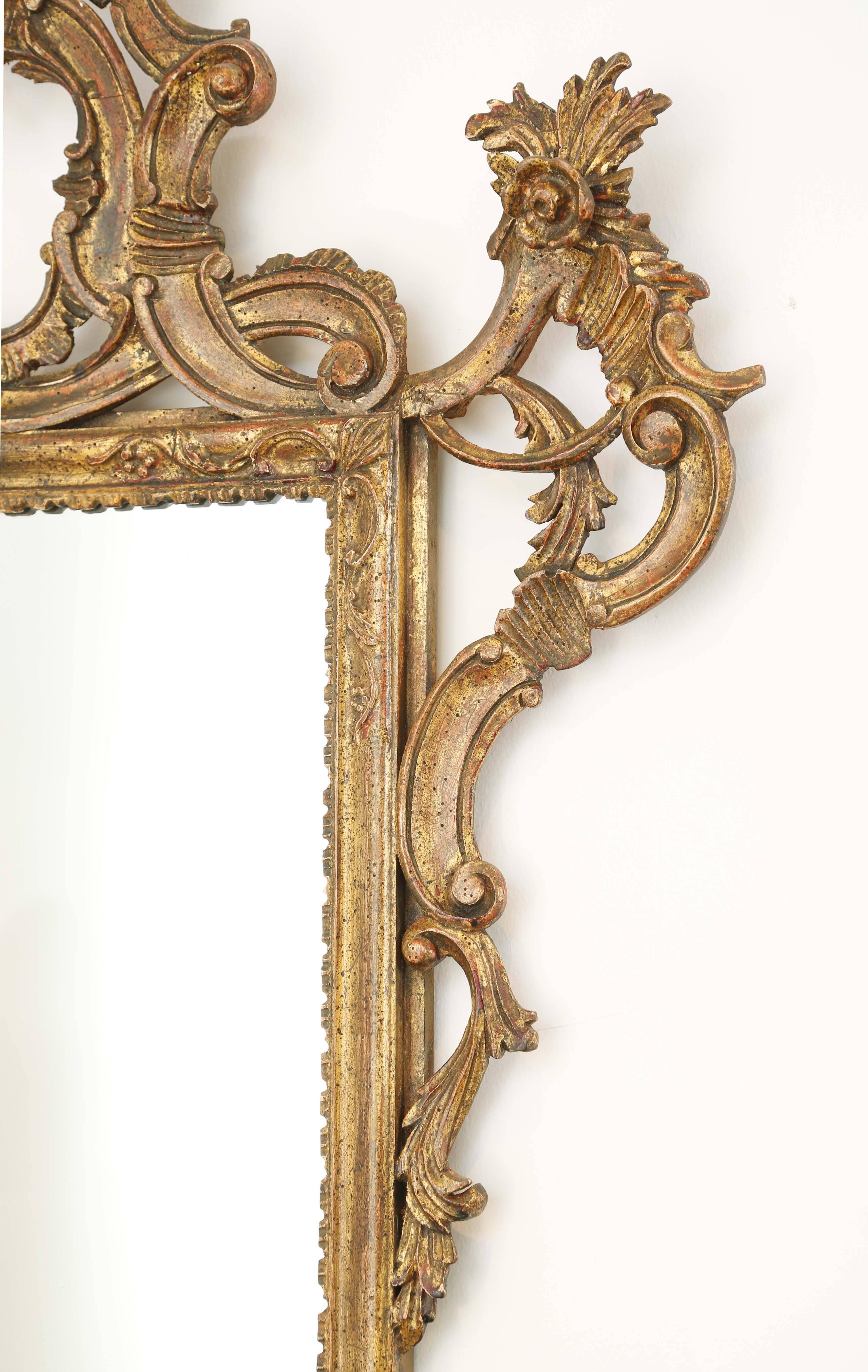Hand-Carved Carved Giltwood Italian Rococo Mirror For Sale