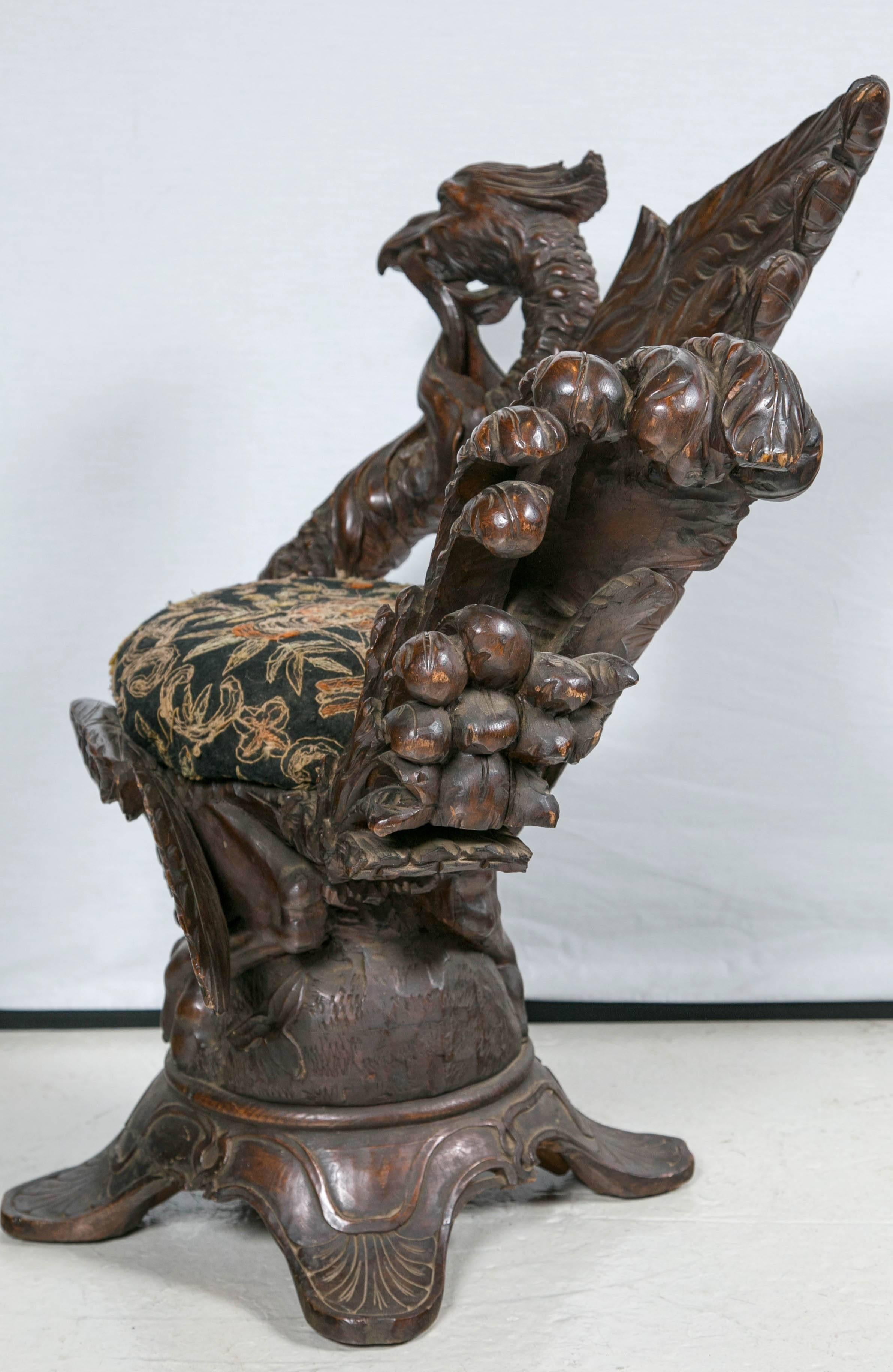 Late 19th Century 19th Century Carved Black Forest Chair with an Eagle