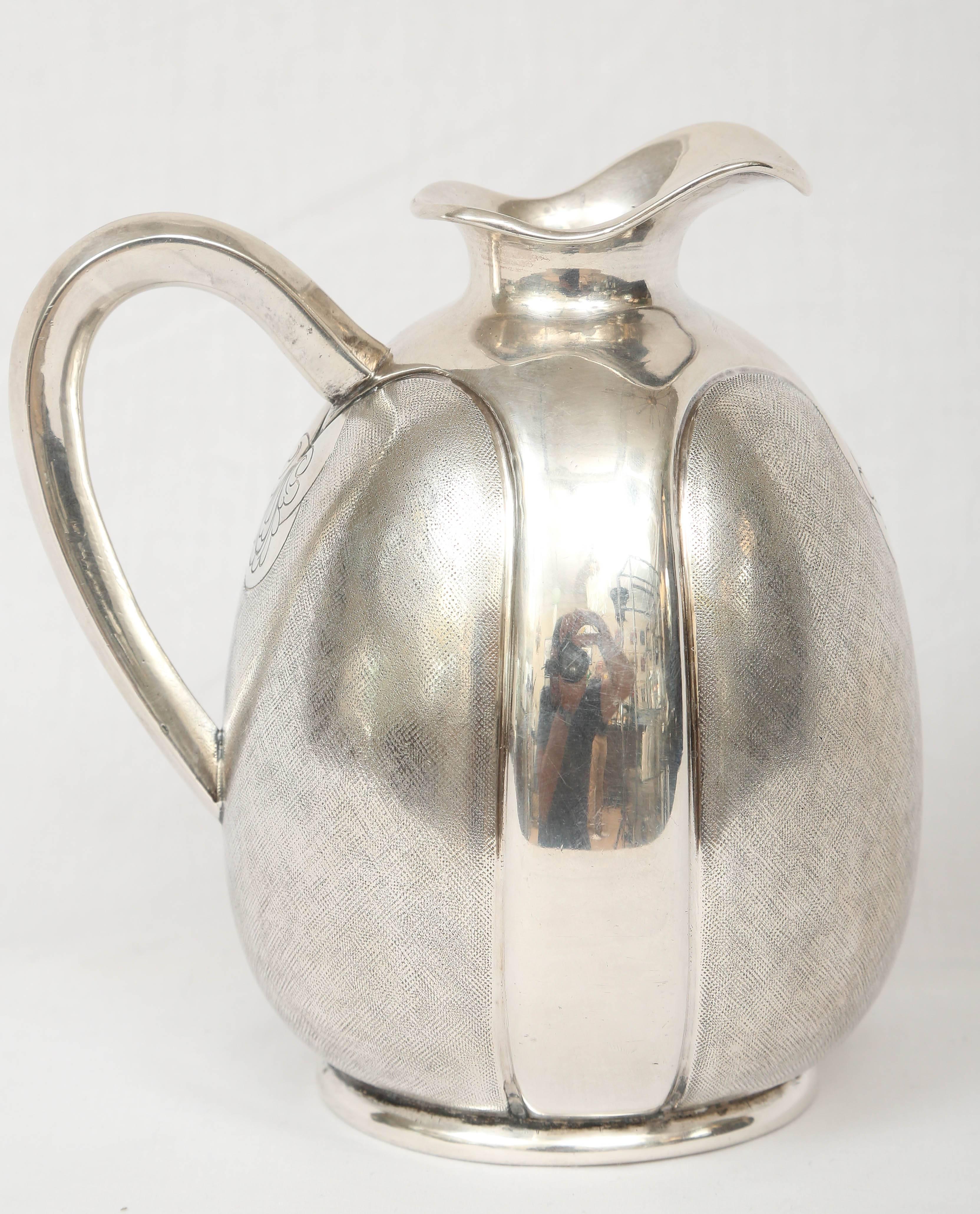 Art Deco vase by Fratelli Cacchione from Milano. Marked 39-MI. Beautiful silver vase or carafe crafted from 800 Silver in the Art Deco period.

The Italian jewelry centers writes the following about Fratelli Cacchione:
Company Profile
Fratelli