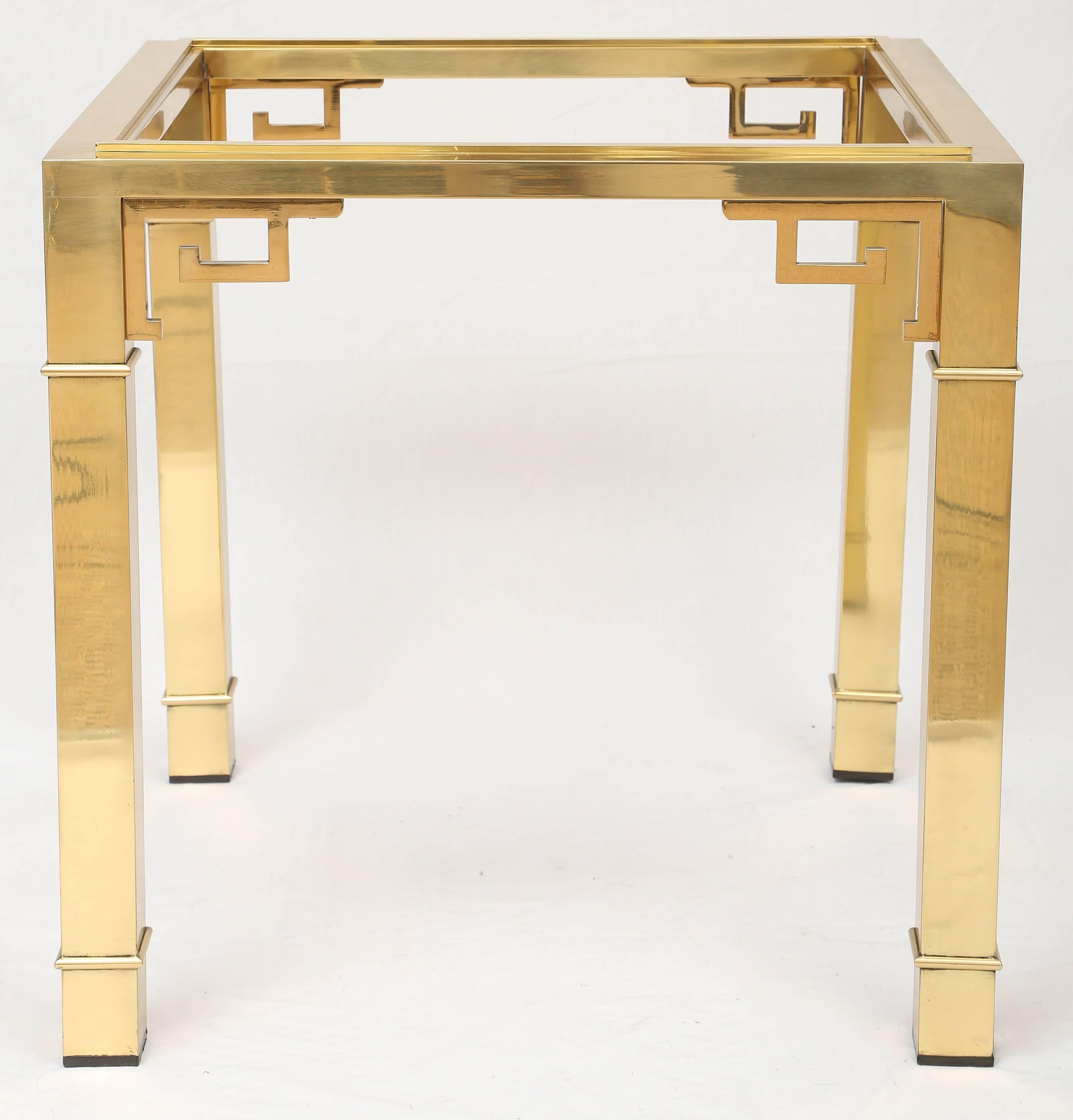 Pair of Mastercraft side tables with Greek key detail. Brass.