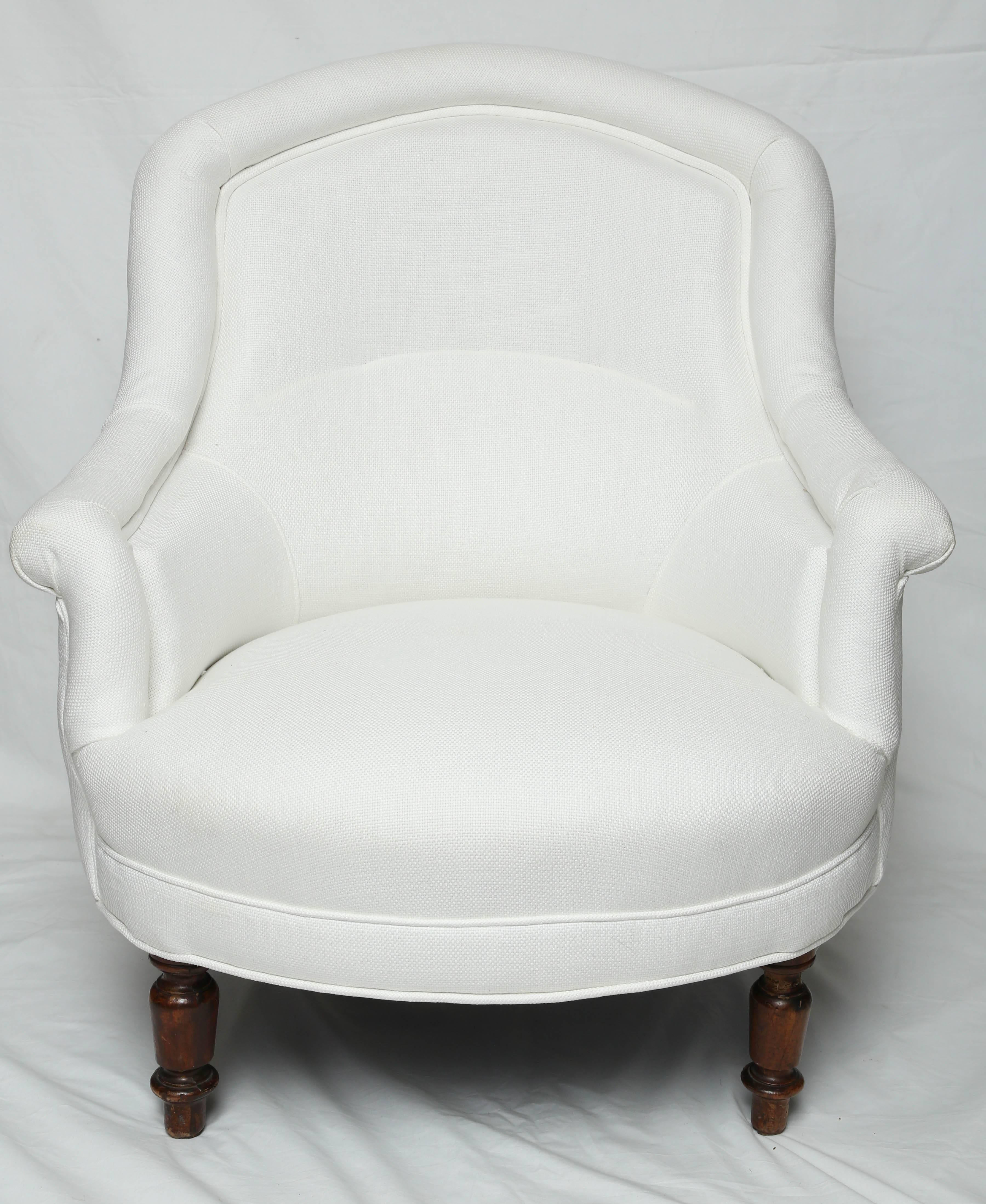 Late 19th century pair of charming Provençal French armchairs in white Egyptian linen. Perfect for bedroom, small room or fire place.