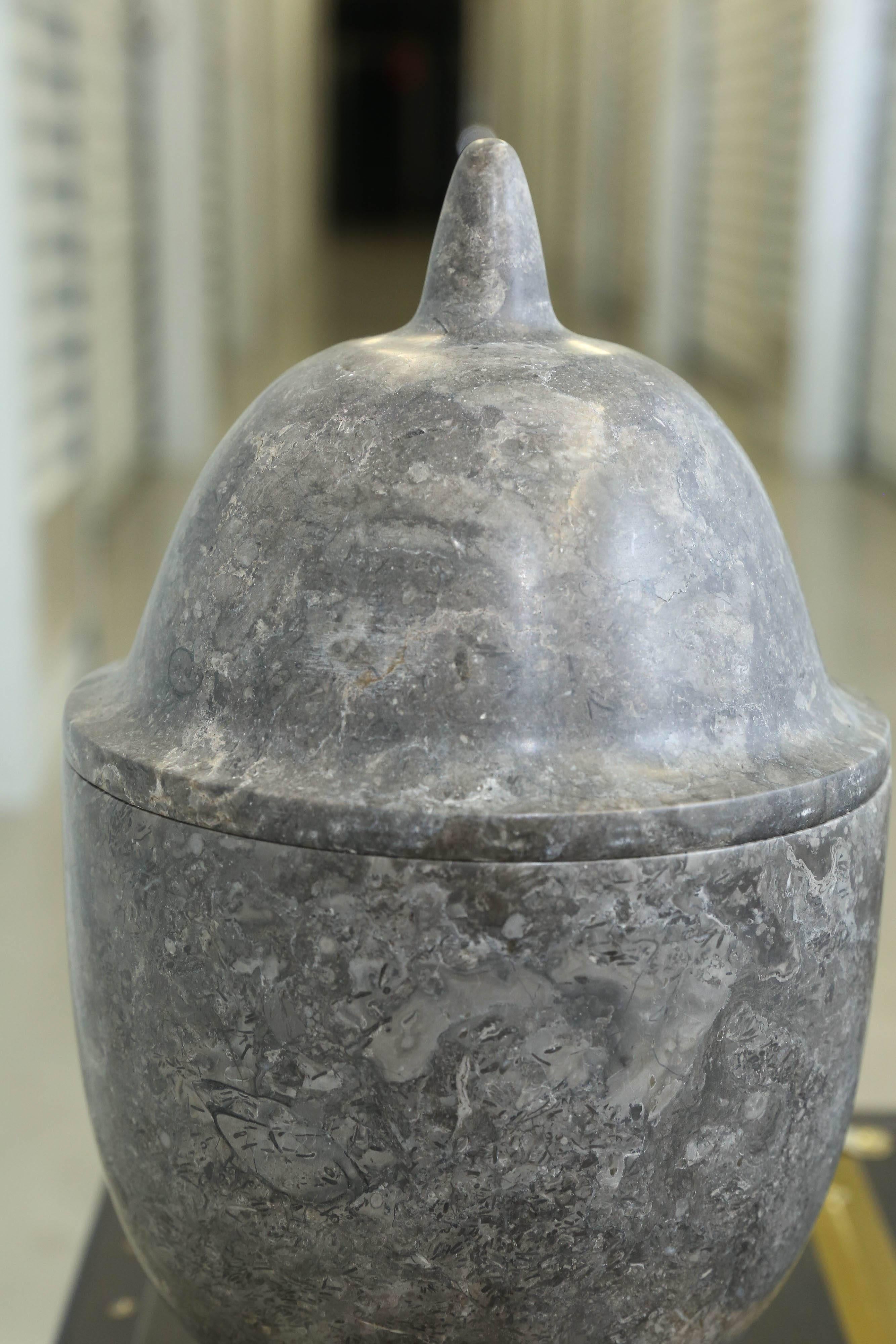Stone jar and top in marble.