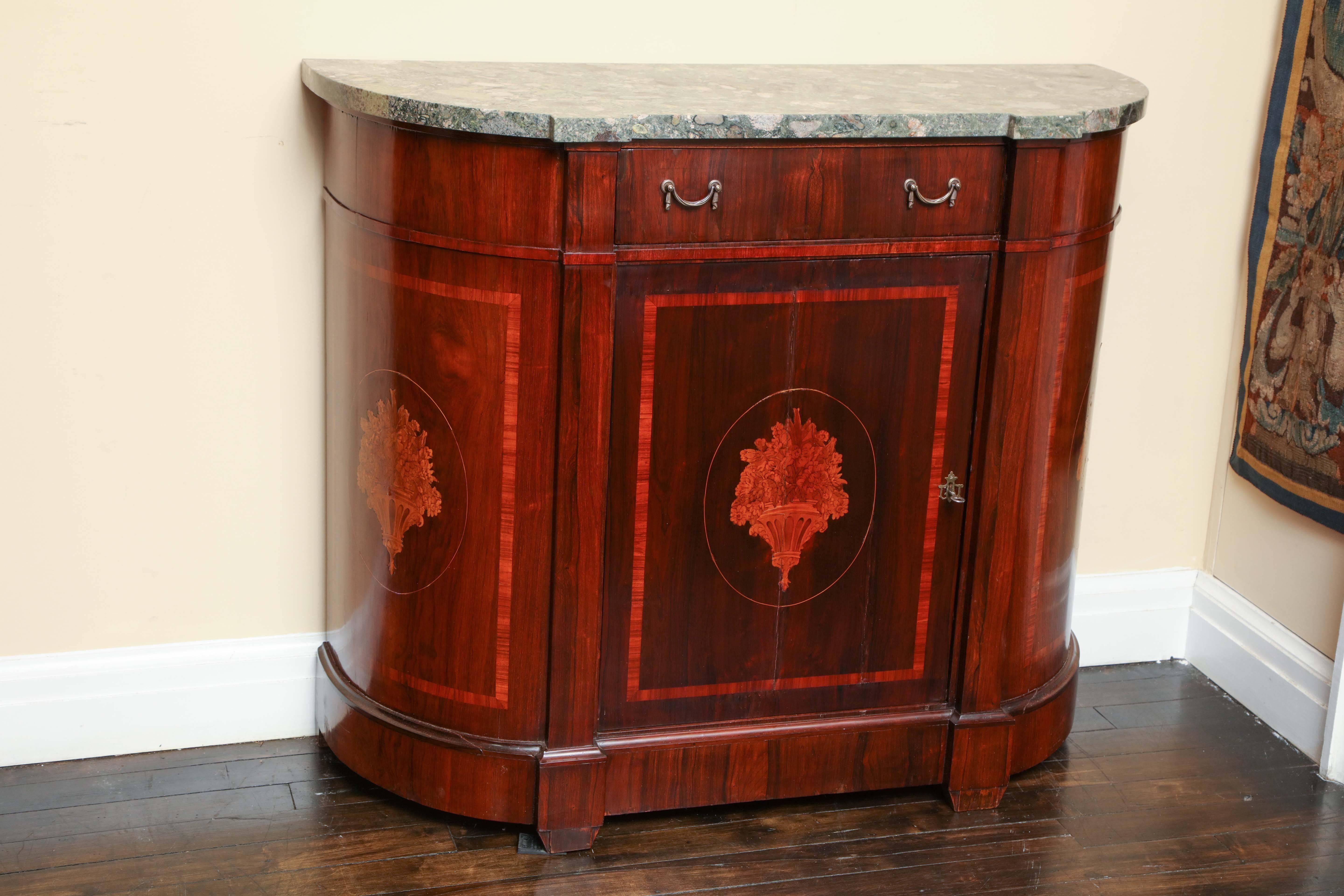 Pair of mid-19th century English inlaid cupboards with drawer and later marble tops.