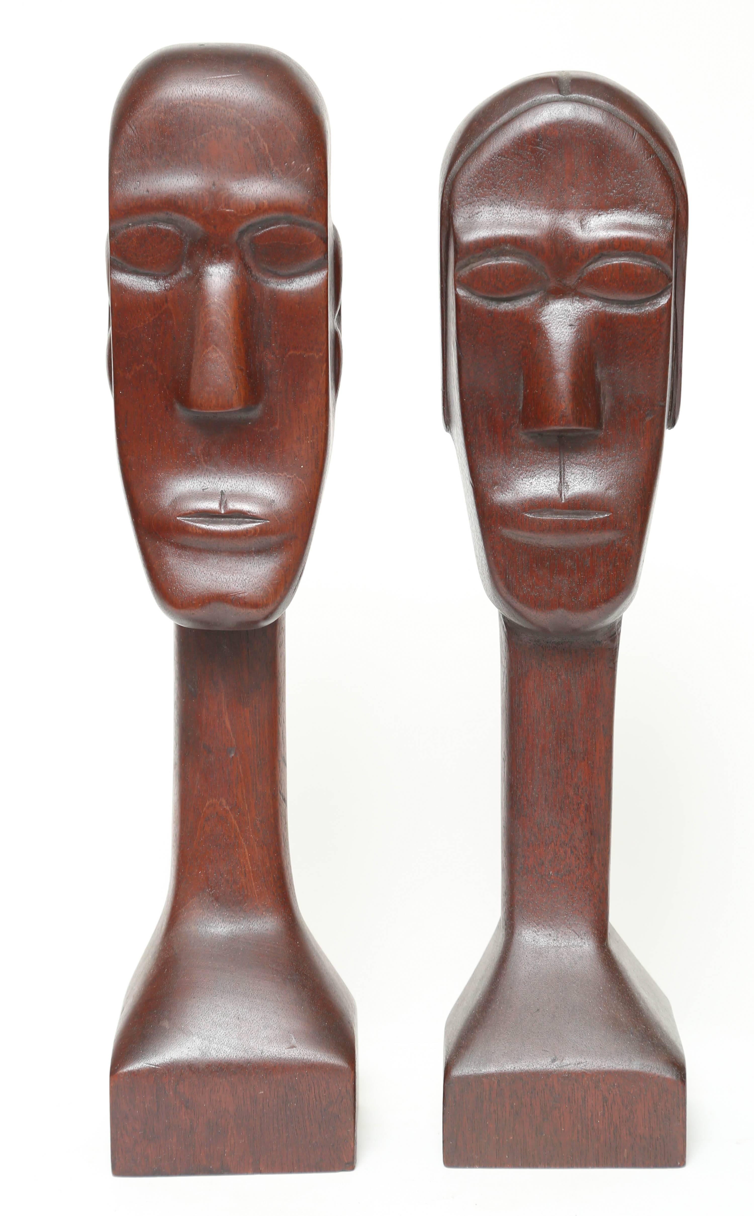 These amazing sculptural Folk Art pieces are very modern in appearance. Done by someone who obviously had knowledge of proportion and scale, these pieces are very slender and elegant which gives them a very modern appearance. Each figure is carved