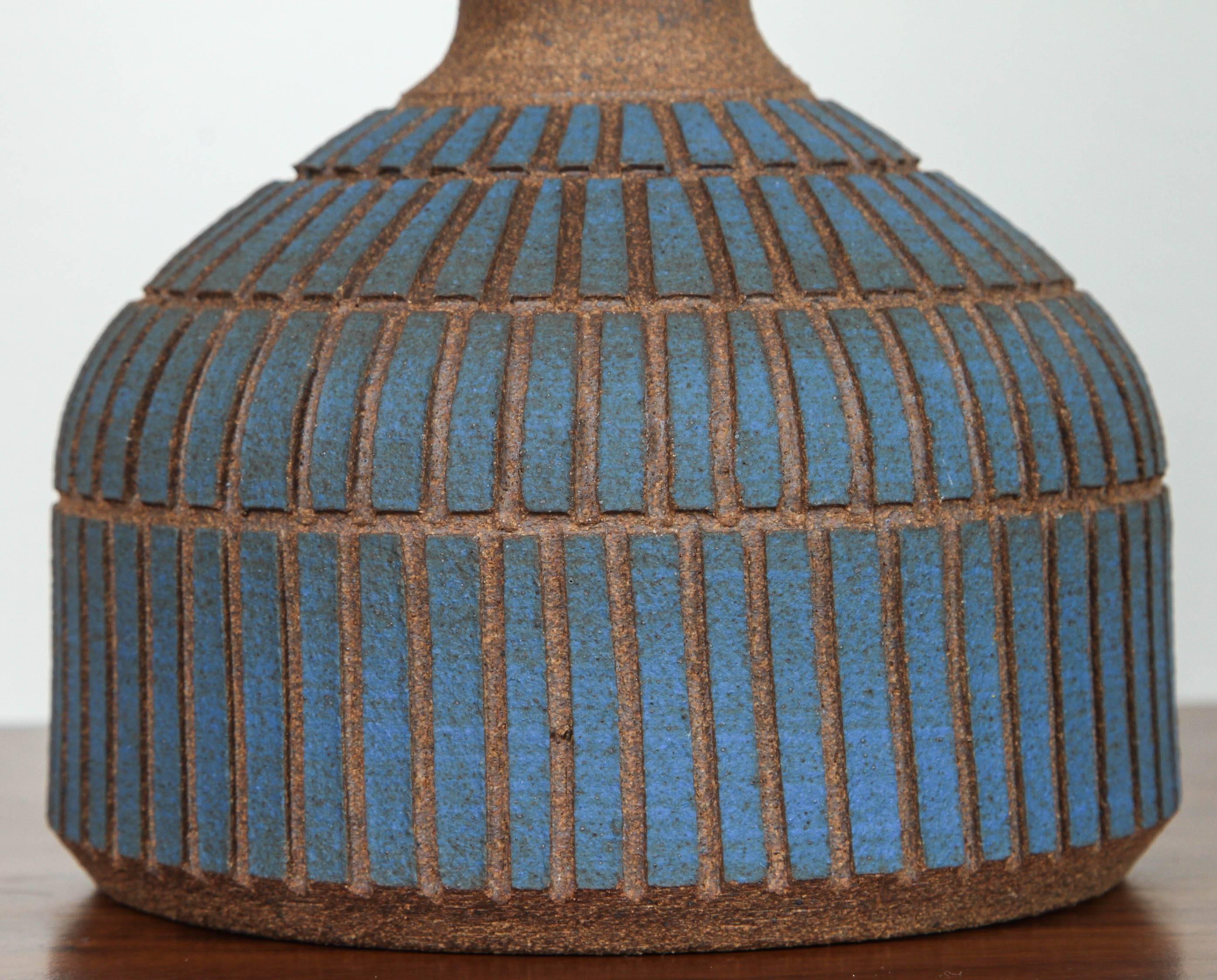 Blue etched tile ceramic lamp by Meredith Metcalf.