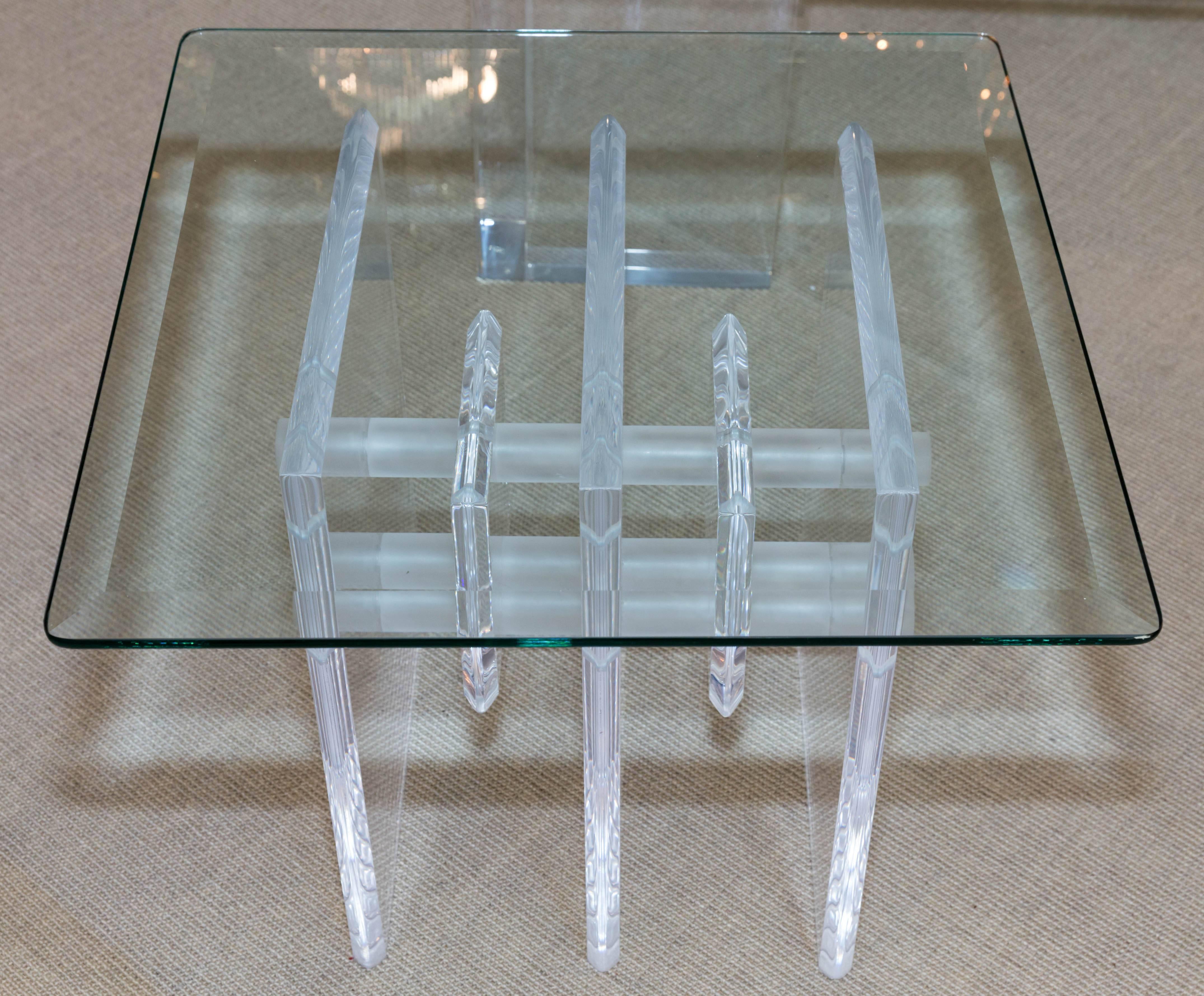 Mid-Century Lucite occasional table with very attractive base and beveled glass top.
