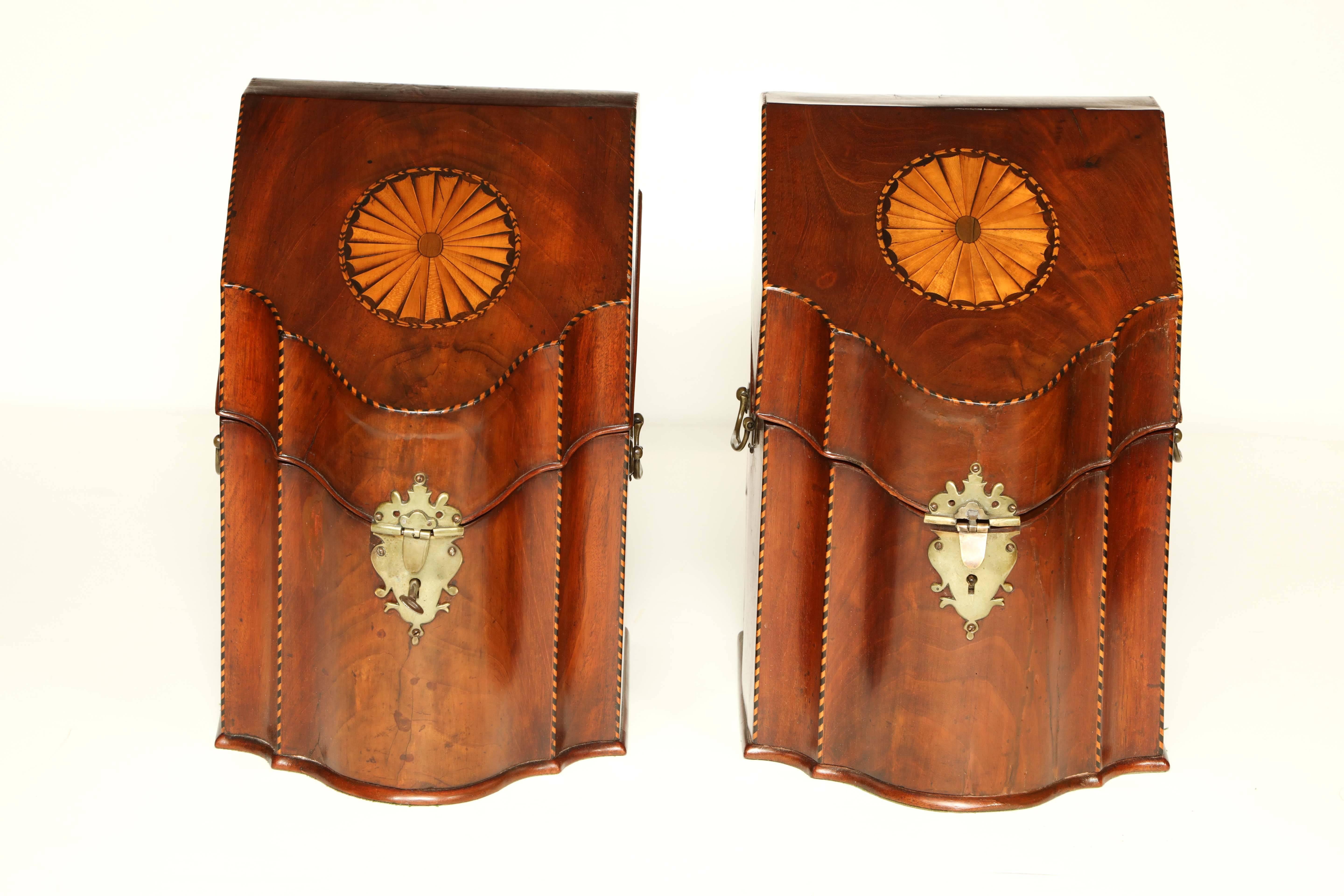 A Fine pair of Georgian mahogany fan and line inlaid knife boxes.