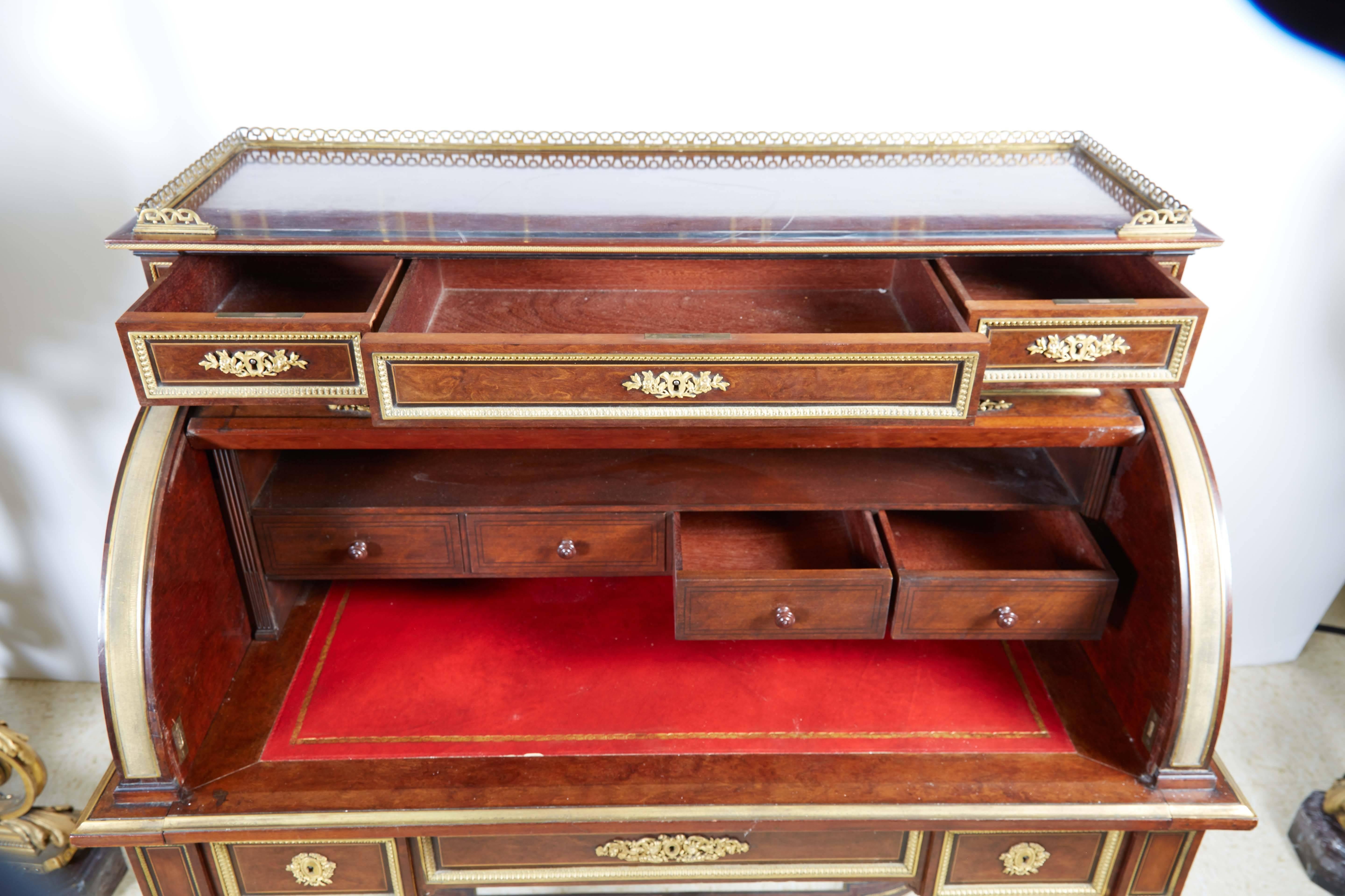 French ormolu-mounted bureau a cylindre roll top desk signed H. Fourdinois.

Veneered in walnut with very fine quality ormolu mounts throughout.

Stamped twice ''H. Fourdinois'' for maker Henri-Auguste Fourdinois (1830-1907).

The rectangular