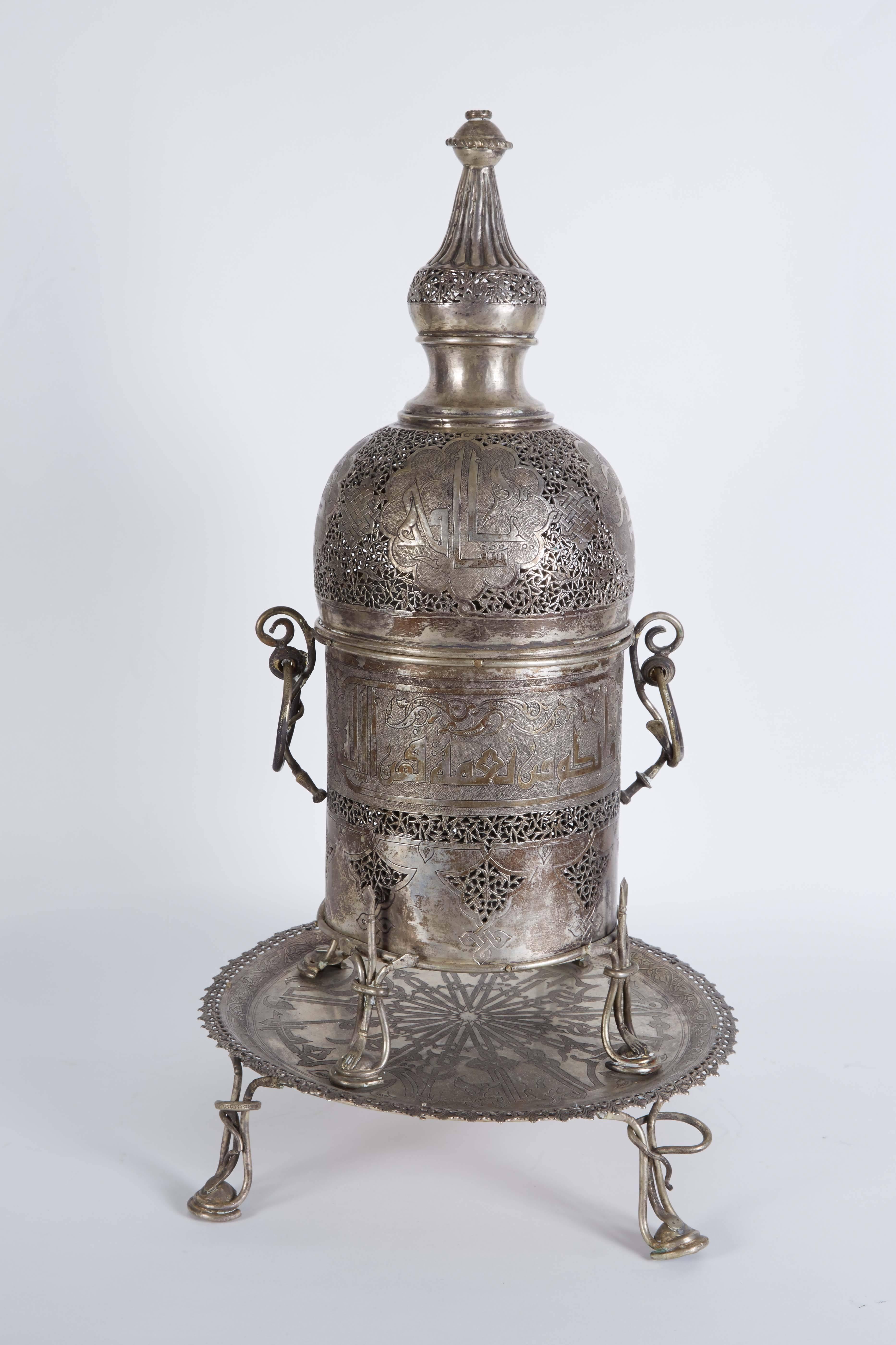 Pair of antique Islamic Persian silver incense burners with Arabic Calligraphy, possibly Qajar period.

Unusual design,

circa 1905-1910.

Tested for silver.

With all original inserts and tools. 

.
