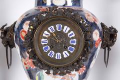 French Japonisme Parcel-Gilt Patinated Bronze Imari Porcelain Clock Garniture