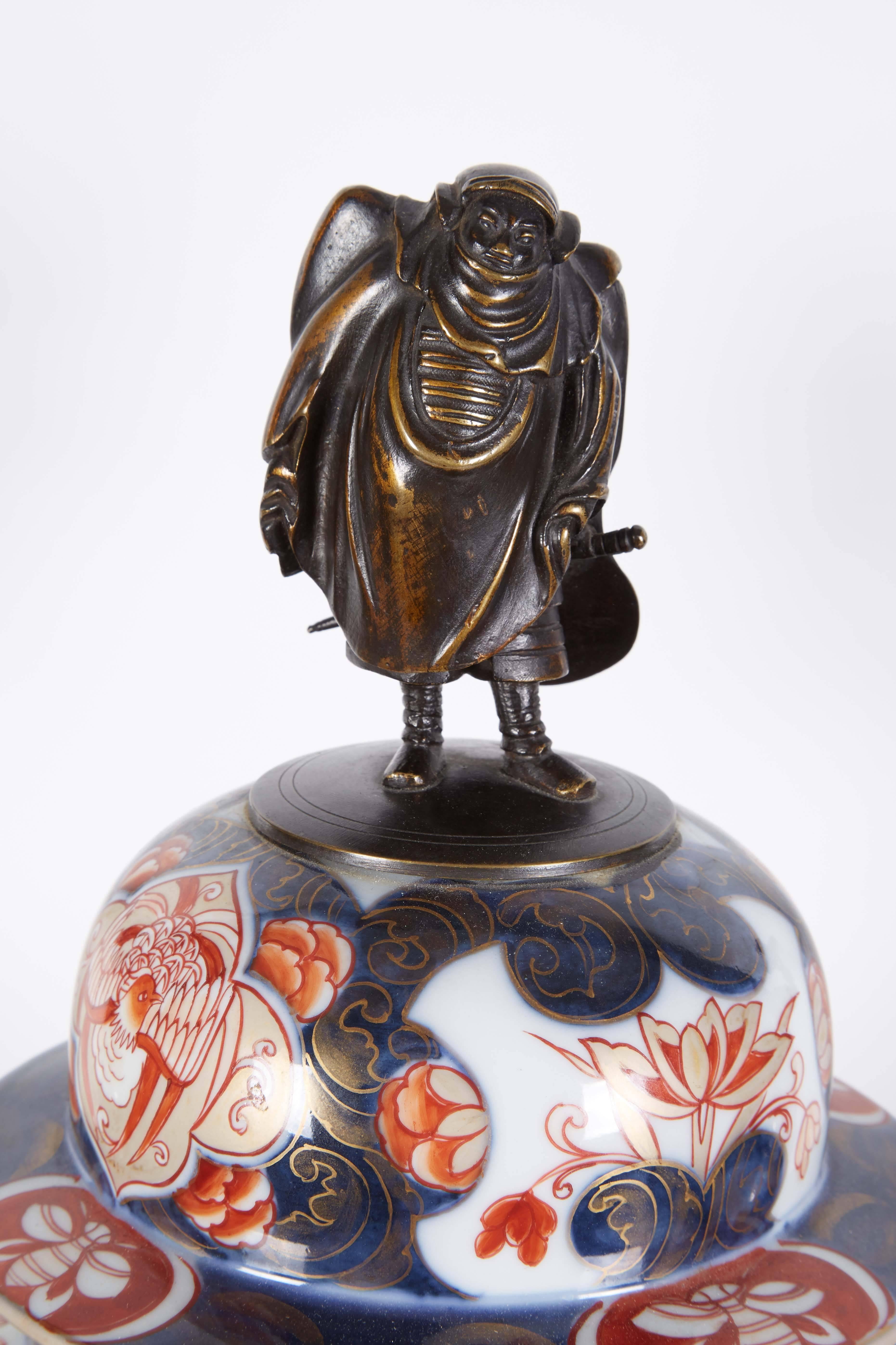 19th Century French Japonisme Parcel-Gilt Patinated Bronze Imari Porcelain Clock Garniture