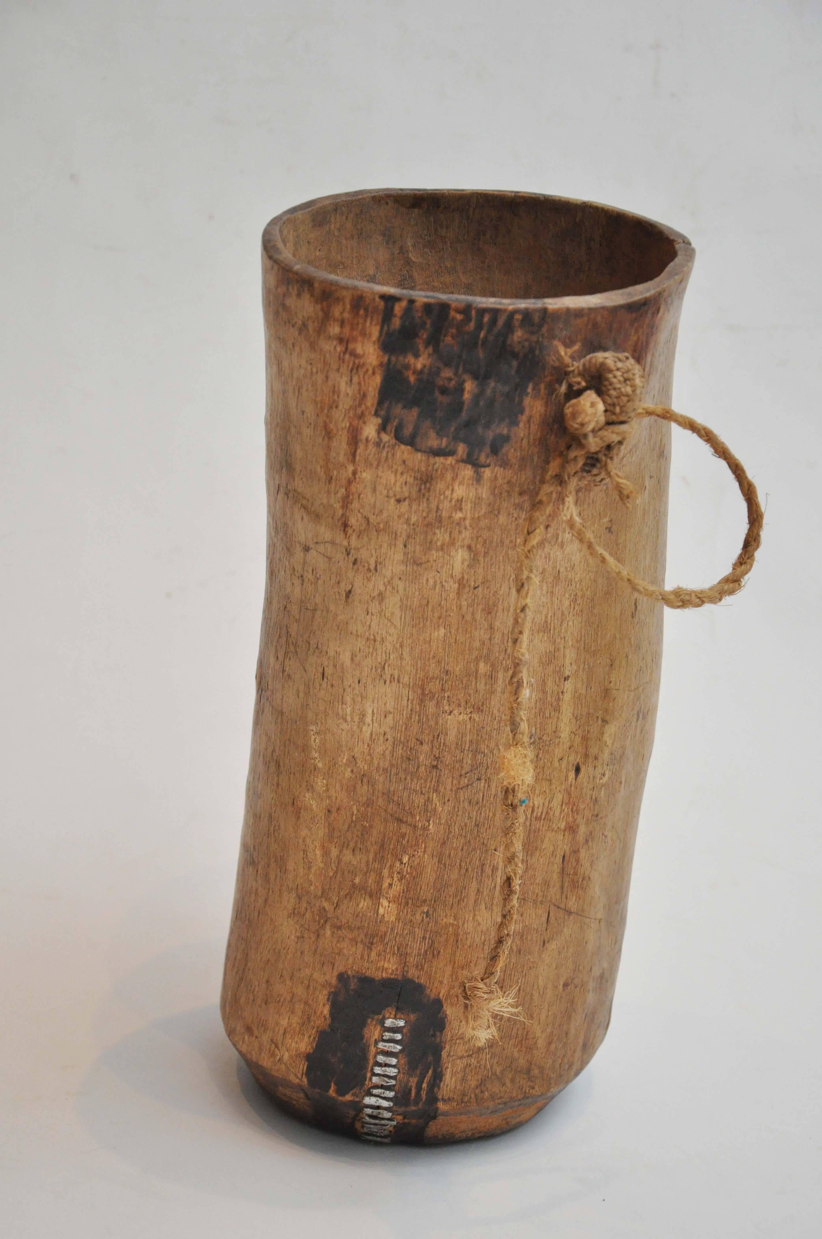 Early 20th Century African Milk Jug in Wood With Metal Repair In Good Condition In Chicago, IL