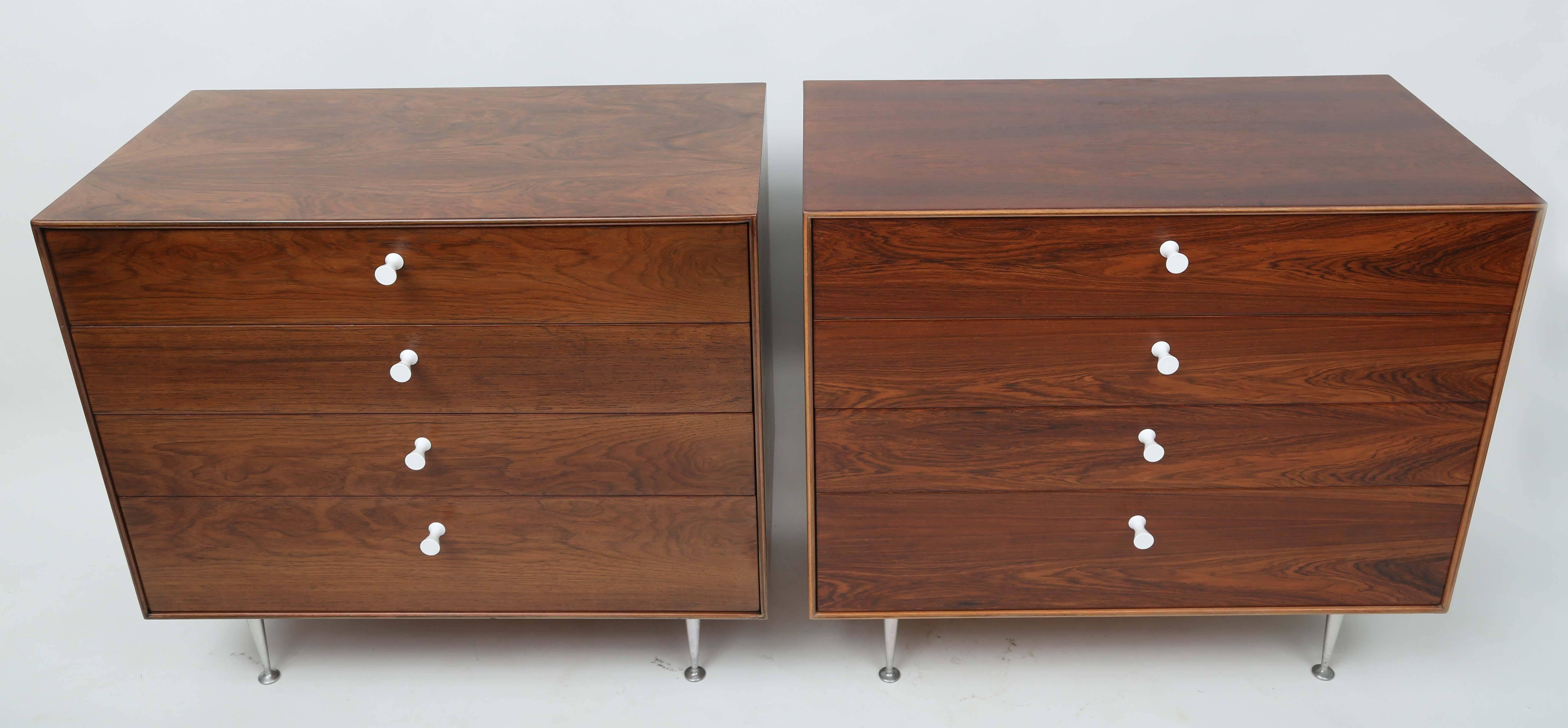 Thin edge dressers by George Nelson for Herman Miller
Porcelain handles and metal legs.
Dressers have been refinished.
 