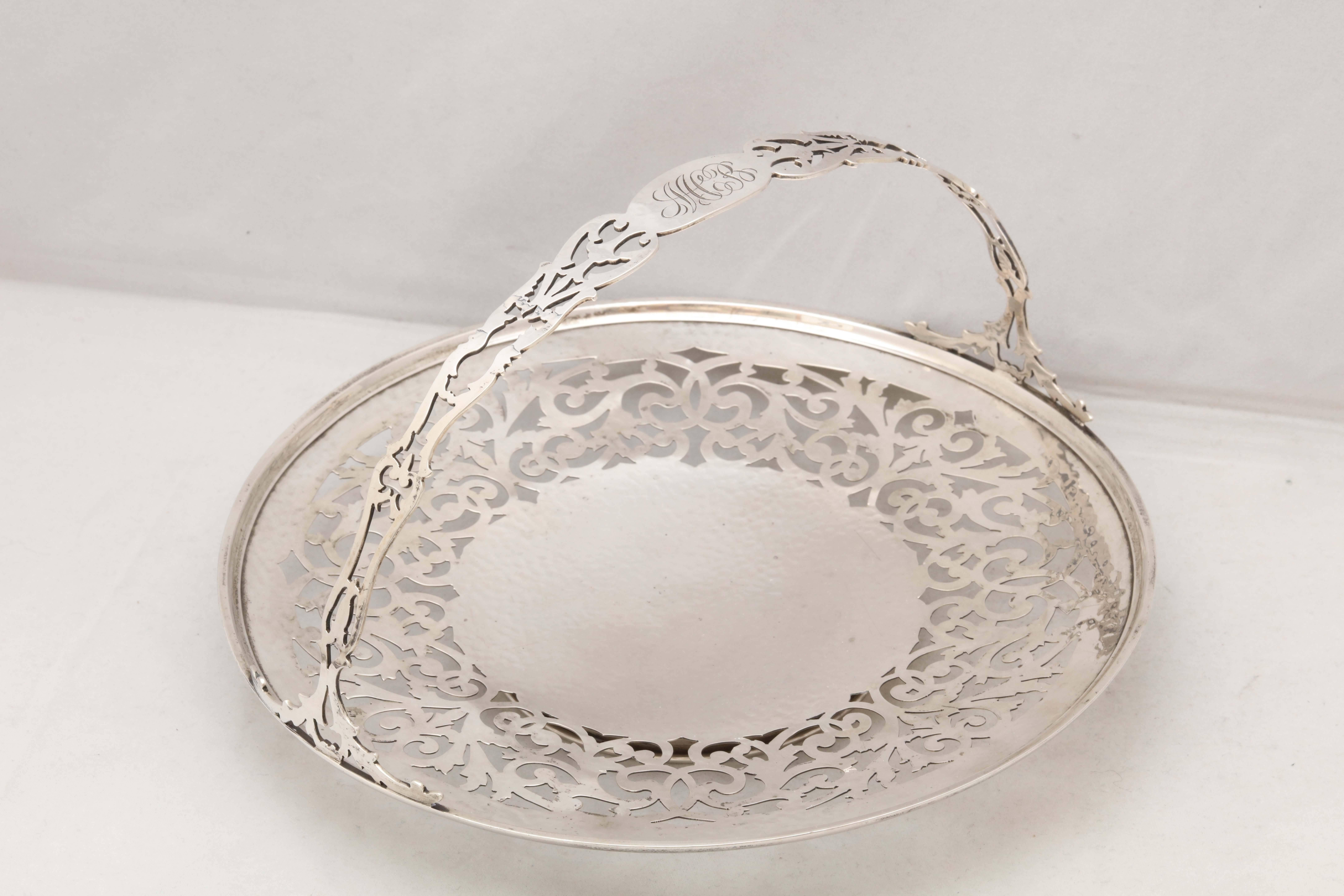 Lovely, sterling silver, Edwardian-style, cake basket on pedestal base, Gorham Manufacturing Co., Providence, Rhode Island, year-marked for 1916. Beautiful pierced work. Silver is lightly hand-hammered. Handle is monogrammed 