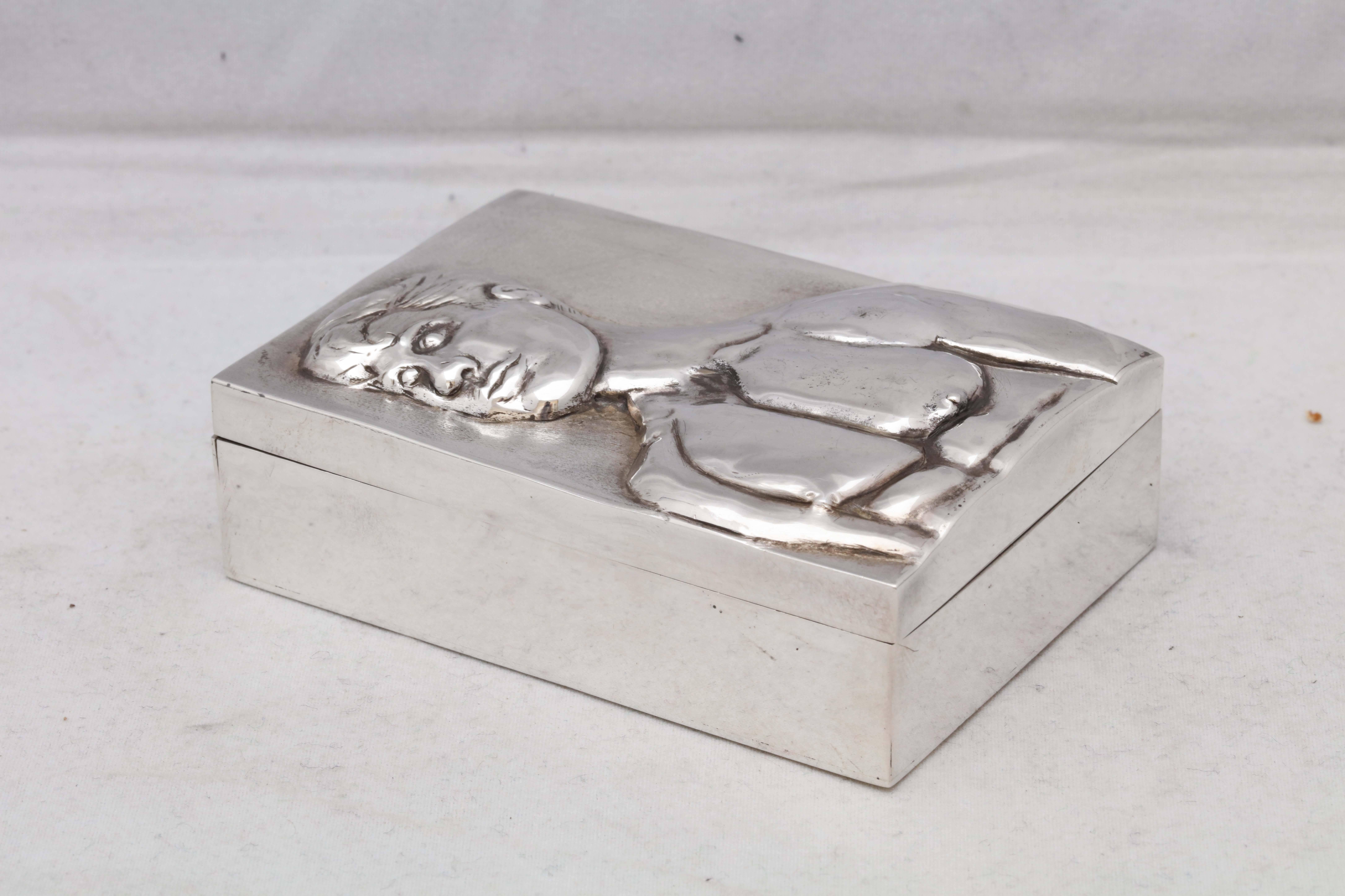 Unusual, rare, sterling silver, Art Deco table box, American, circa 1930s. Hand decorated with the naked torso of a man. Beautiful detail. Measures: Over 3 1/2