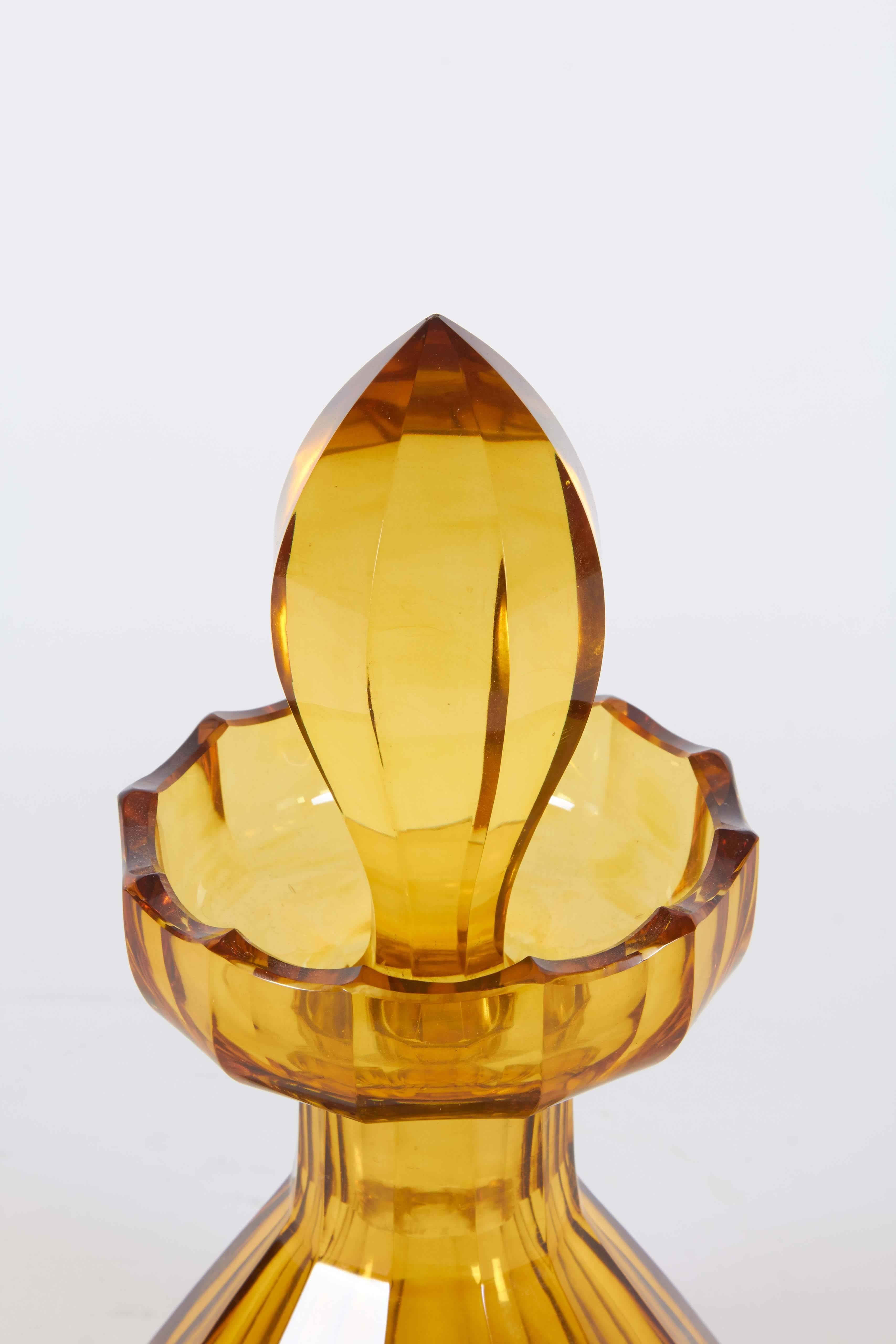 This striking yellow decanter with a stopper is a glamorous addition to your holiday table.