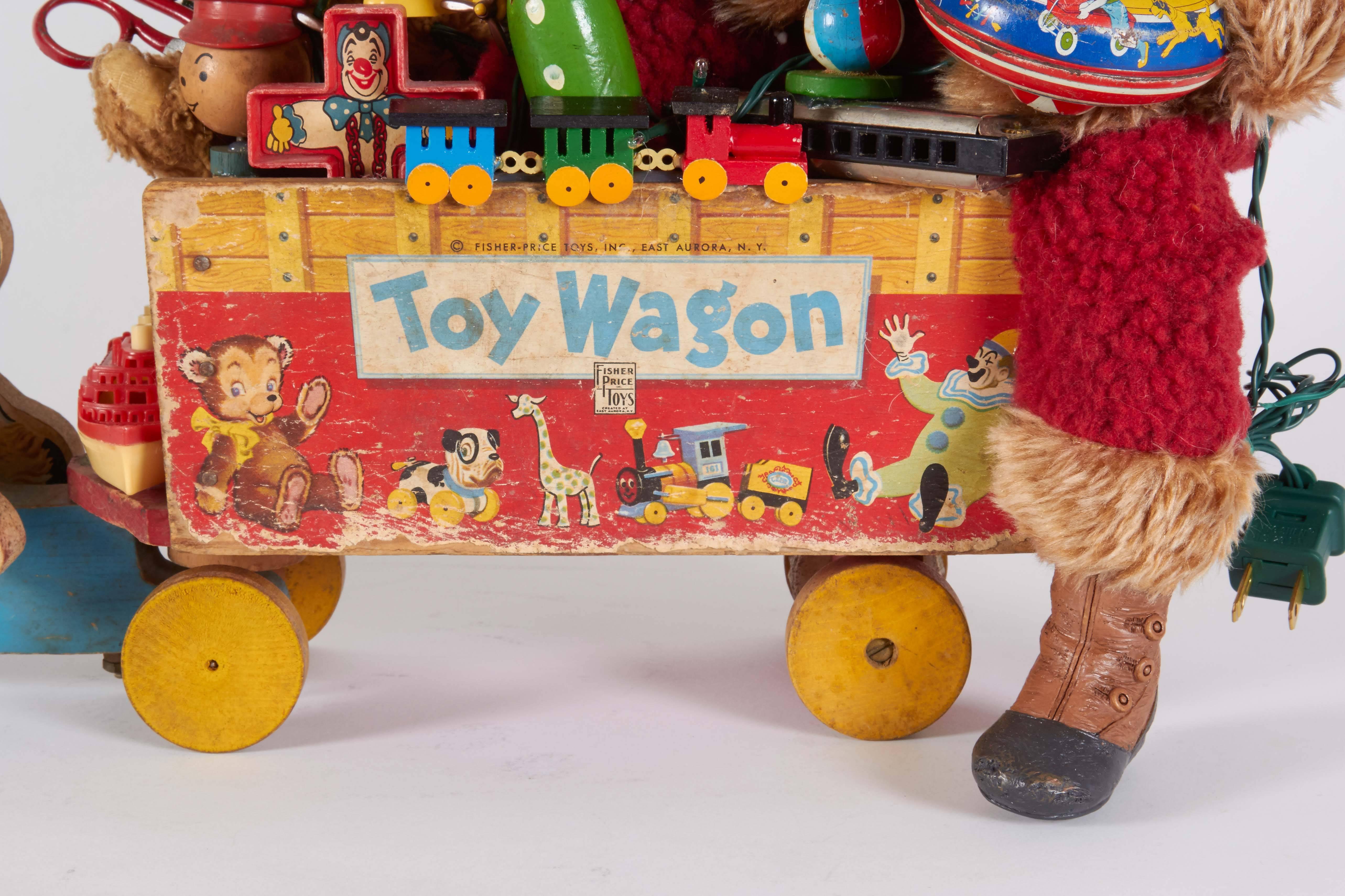 Santa on Toy Wagon collectible by Karen Didion brings a one-of-a-kind vintage look to your Christmas decor. 

Karen incorporates a unique selection of vintage antique toys, ornaments and accessories into each piece as well as her own beautiful