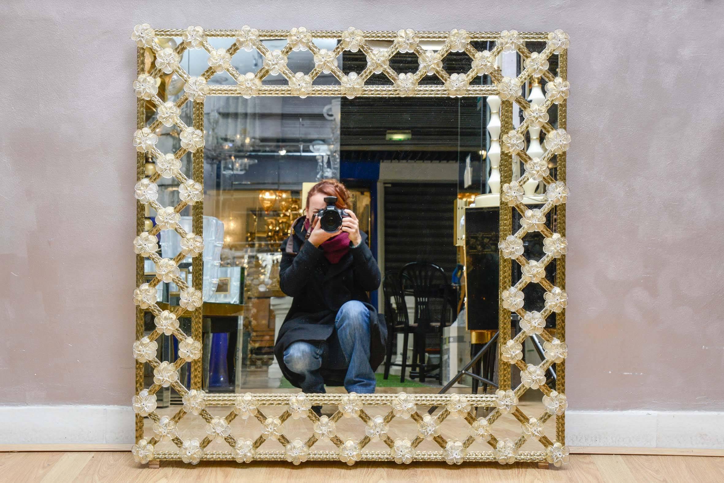 Mirror surrounding with Murano glass.