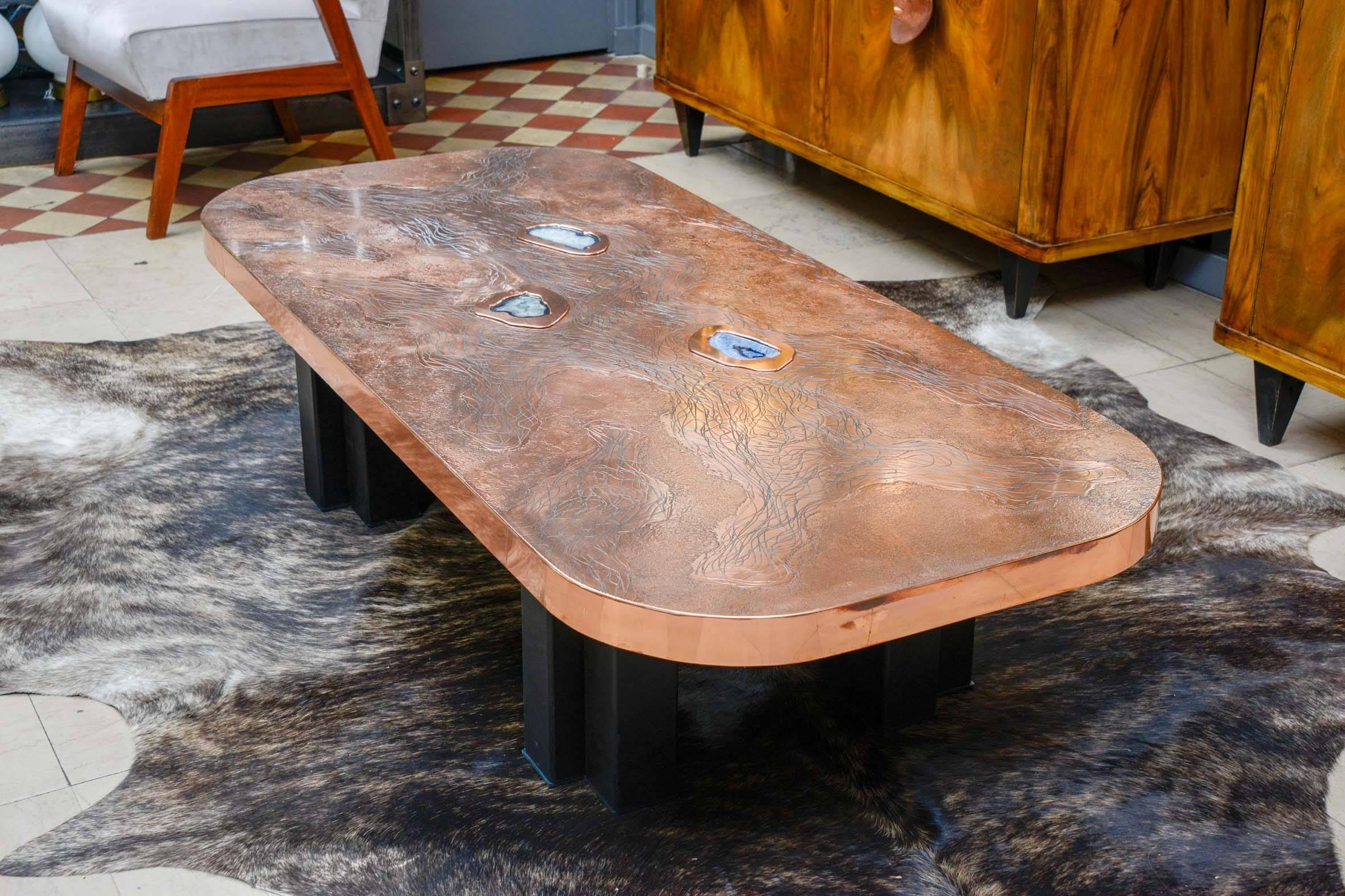 Original low table with three blue agate stones inlaid on the engraved copper top, black metal legs, signed and dated.
