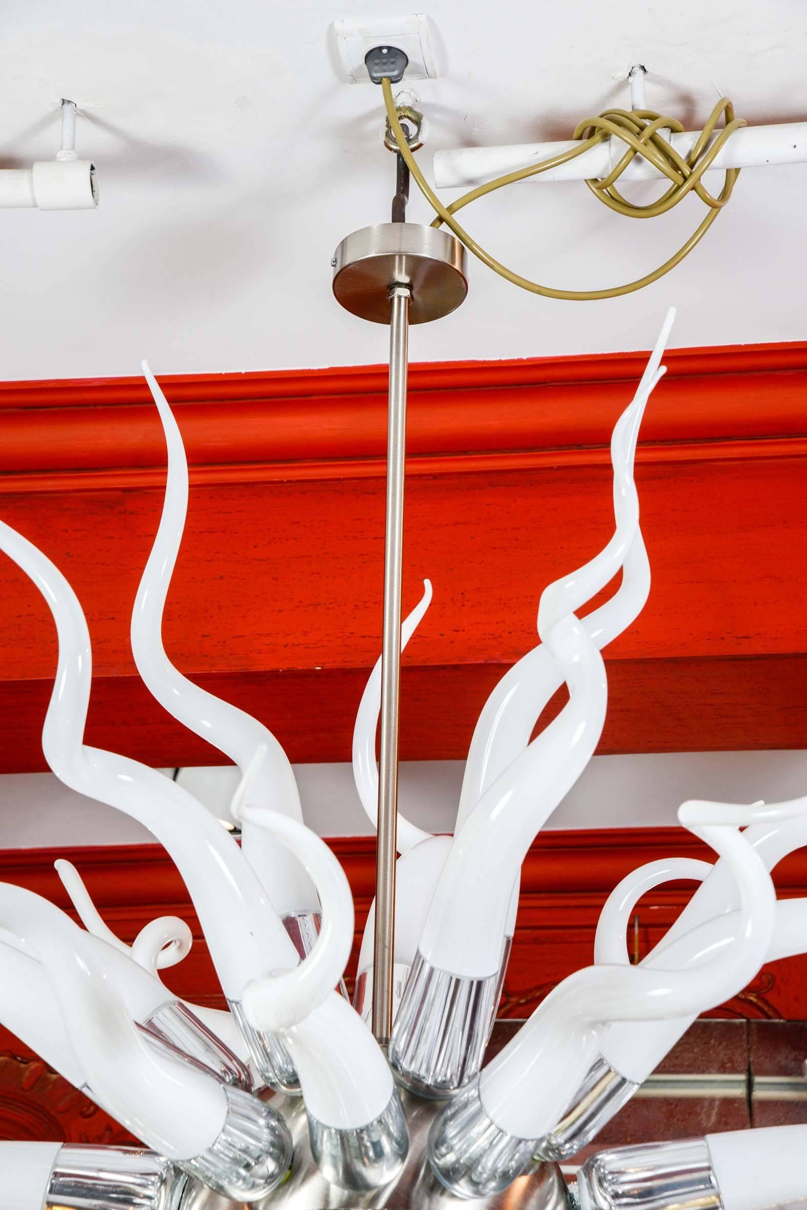 Sputnik shape chandelier, Murano glass horns and nickeled brass structure.