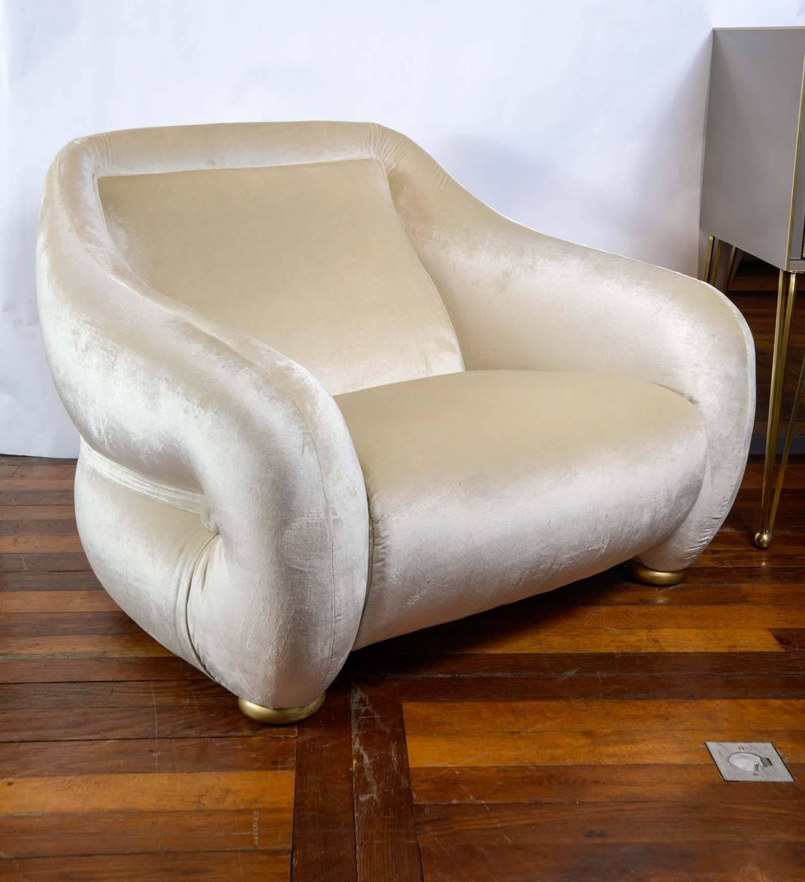 Pair of ivory velvet vintage armchairs, wood feet, very comfortable seating.